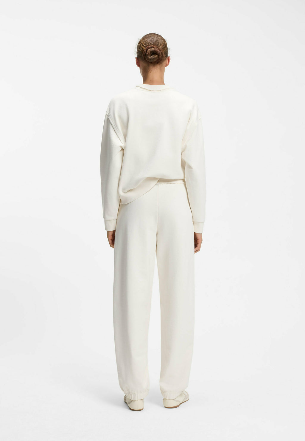 NUEMBRIE_B - Tracksuit bottoms - natural ten