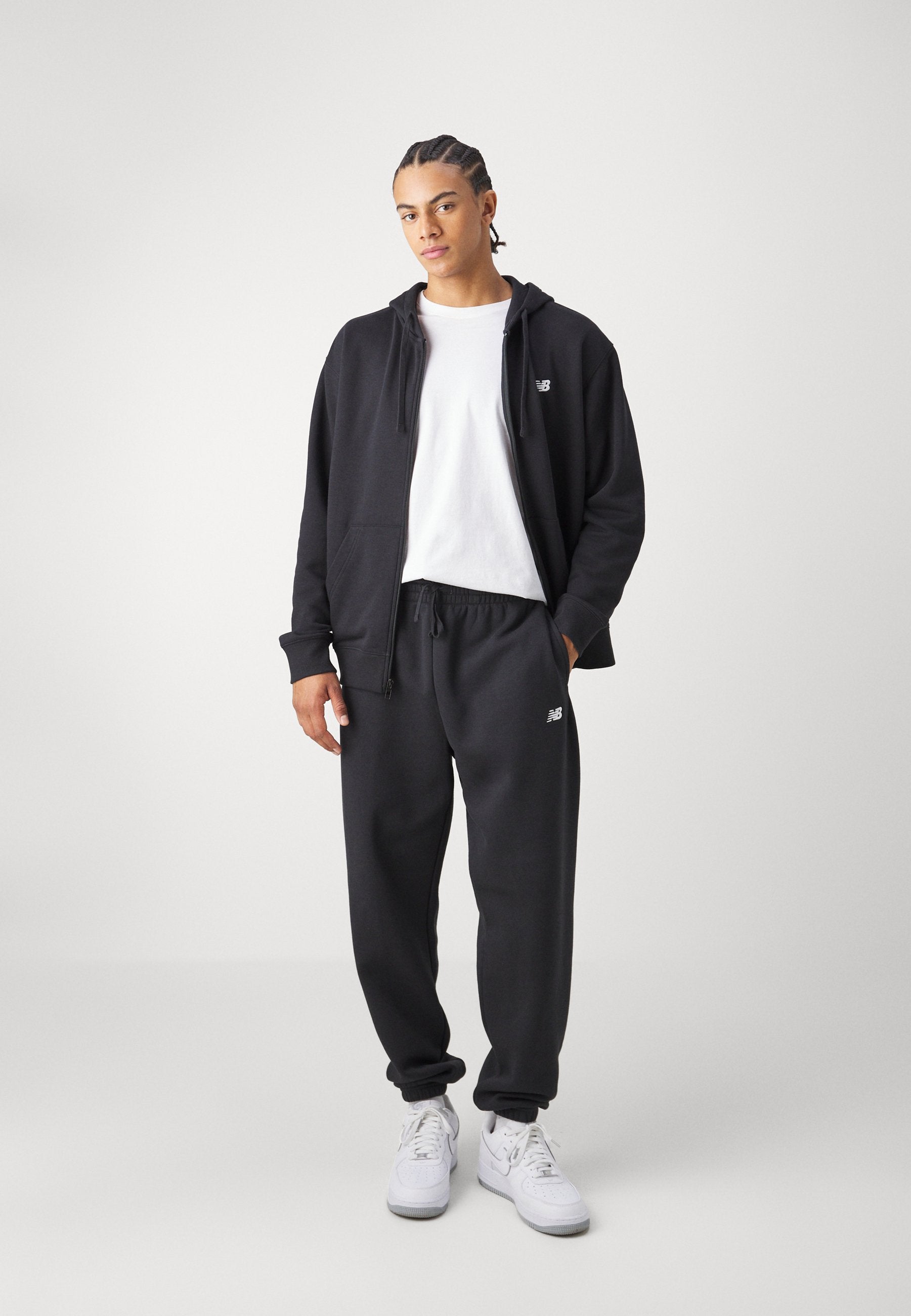 SPORT ESSENTIALS  - Tracksuit bottoms - black