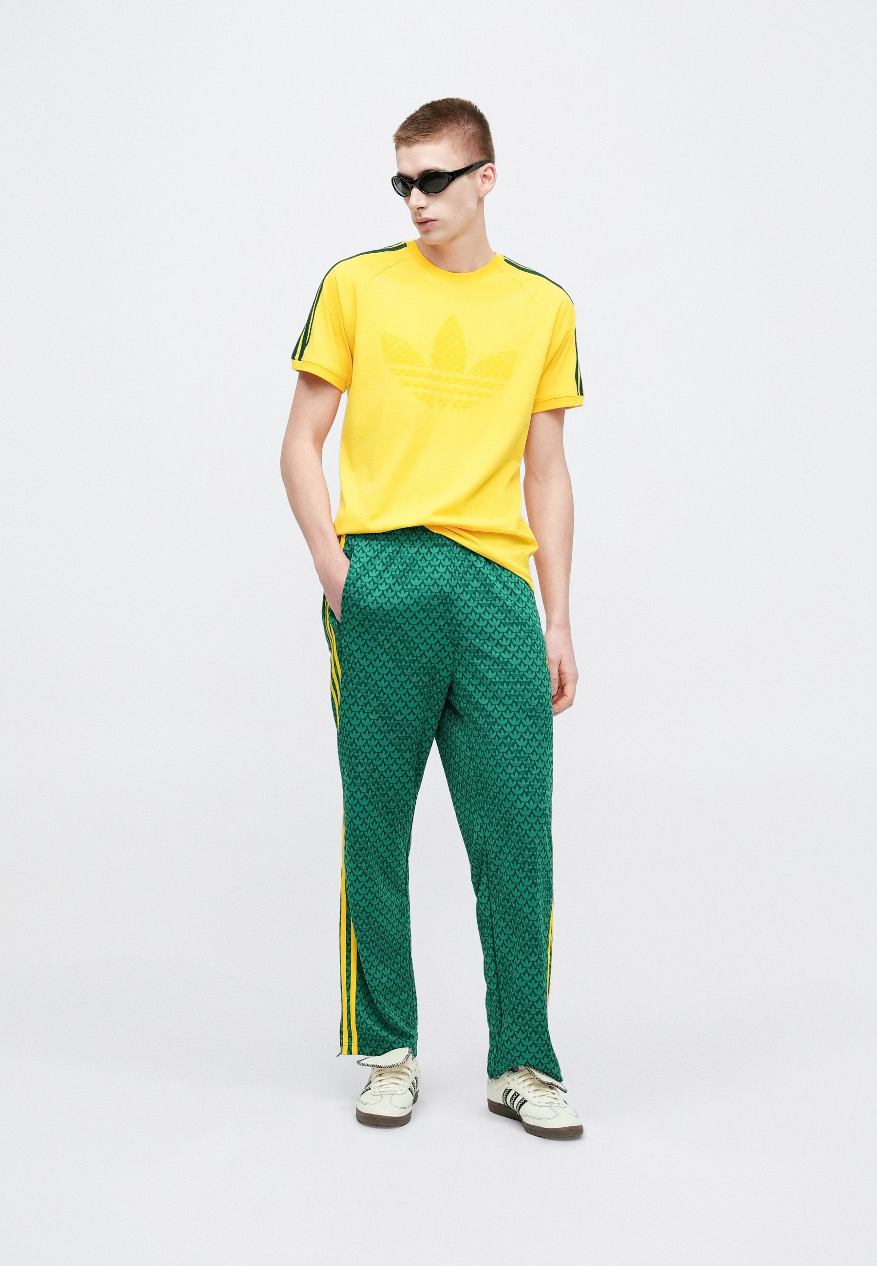 FIREBIRD MONOGRAM - Tracksuit bottoms - collegiate green
