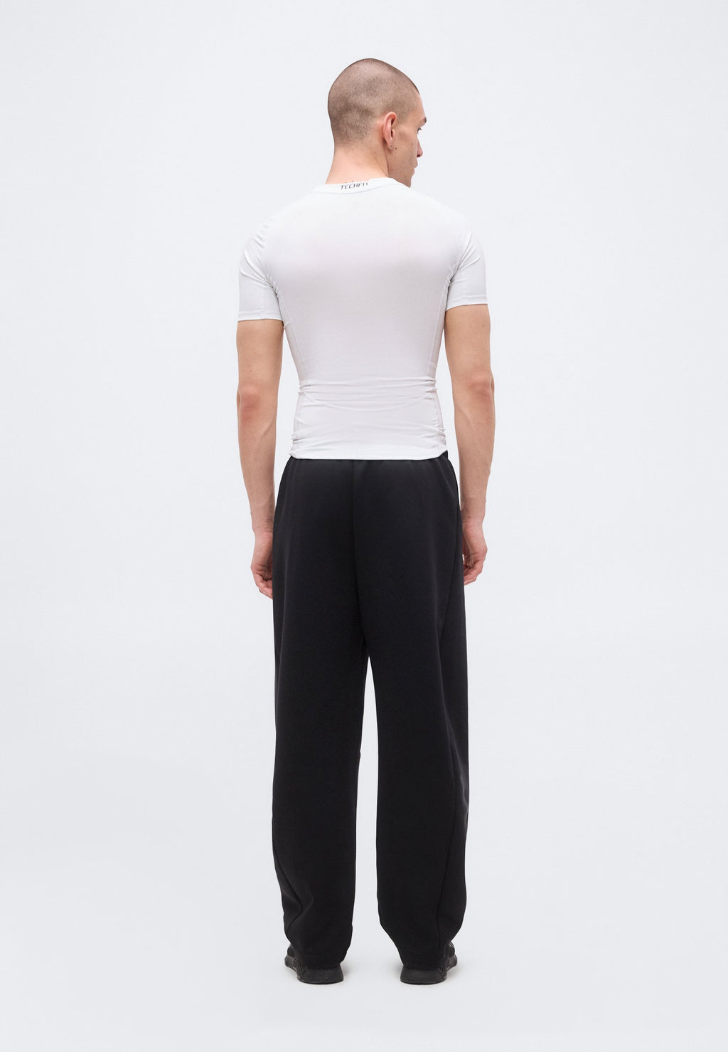 Z.N.E. OPEN HEM - Tracksuit bottoms - black