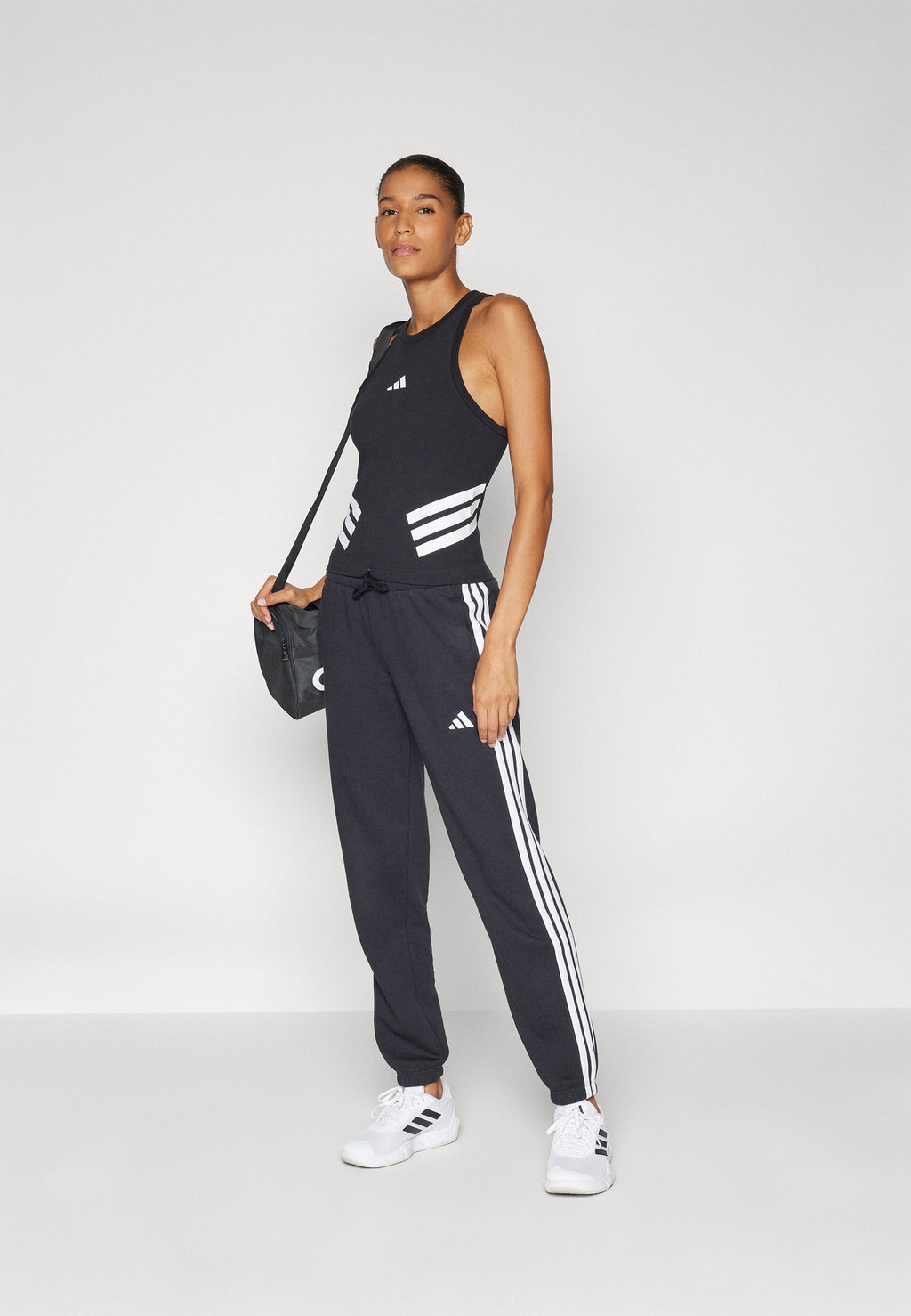 ESSENTIALS 3 STRIPES FRENCH TERRY CUFFED - Tracksuit bottoms - black/white