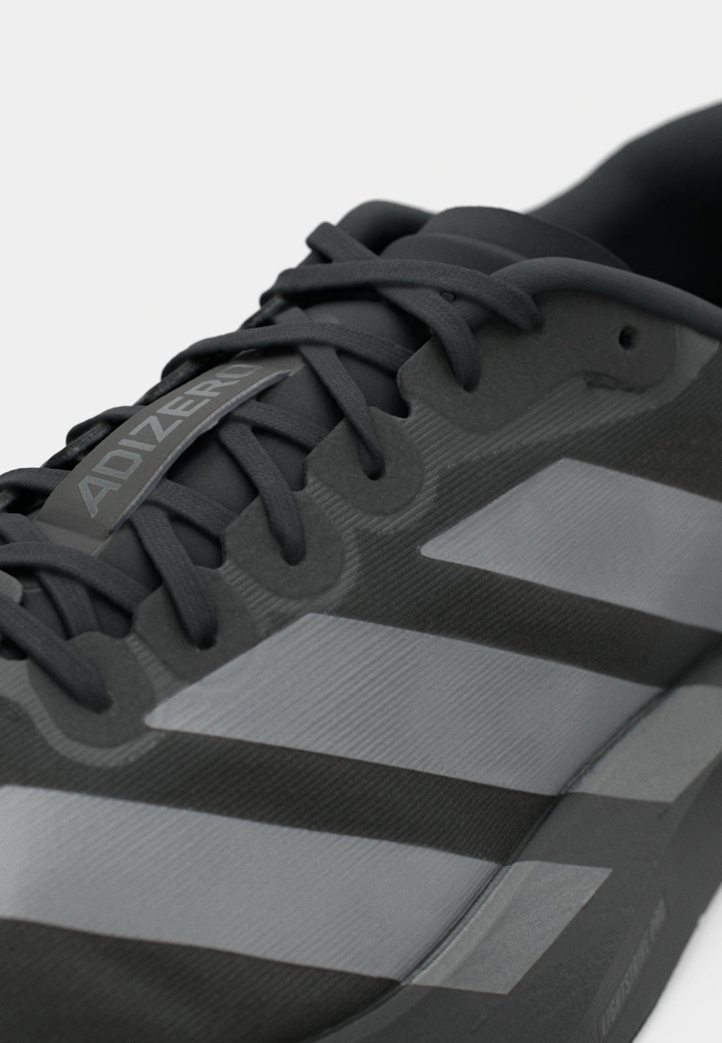 ADIZERO EVO SL M - Trainers - core black/iron metallic/grey four