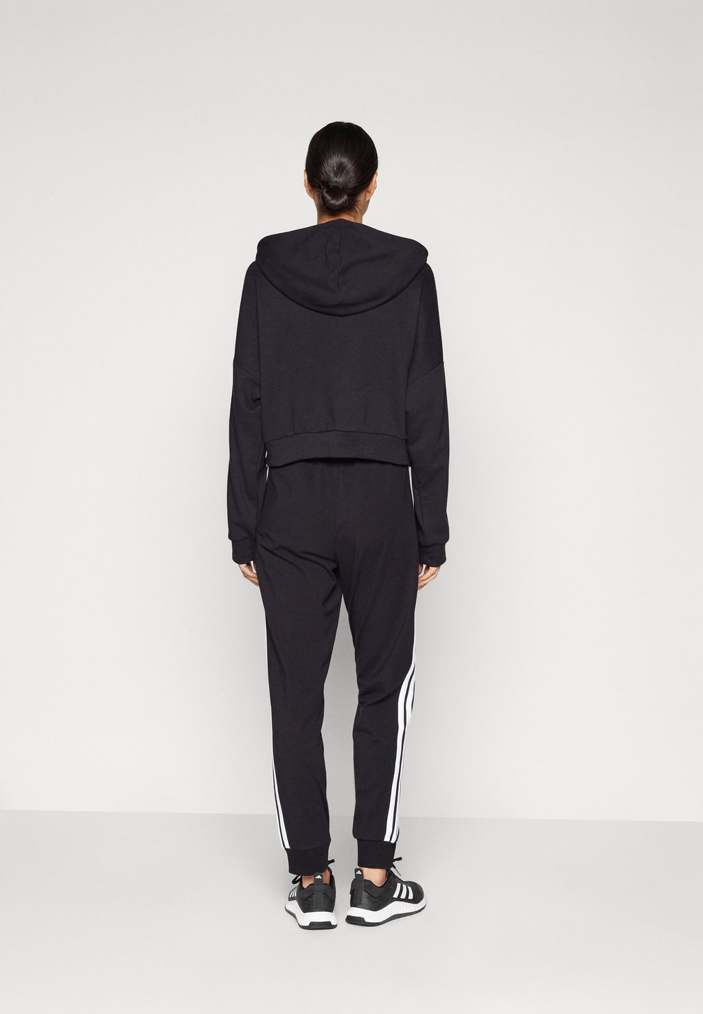 JOGGER - Tracksuit bottoms - black/white