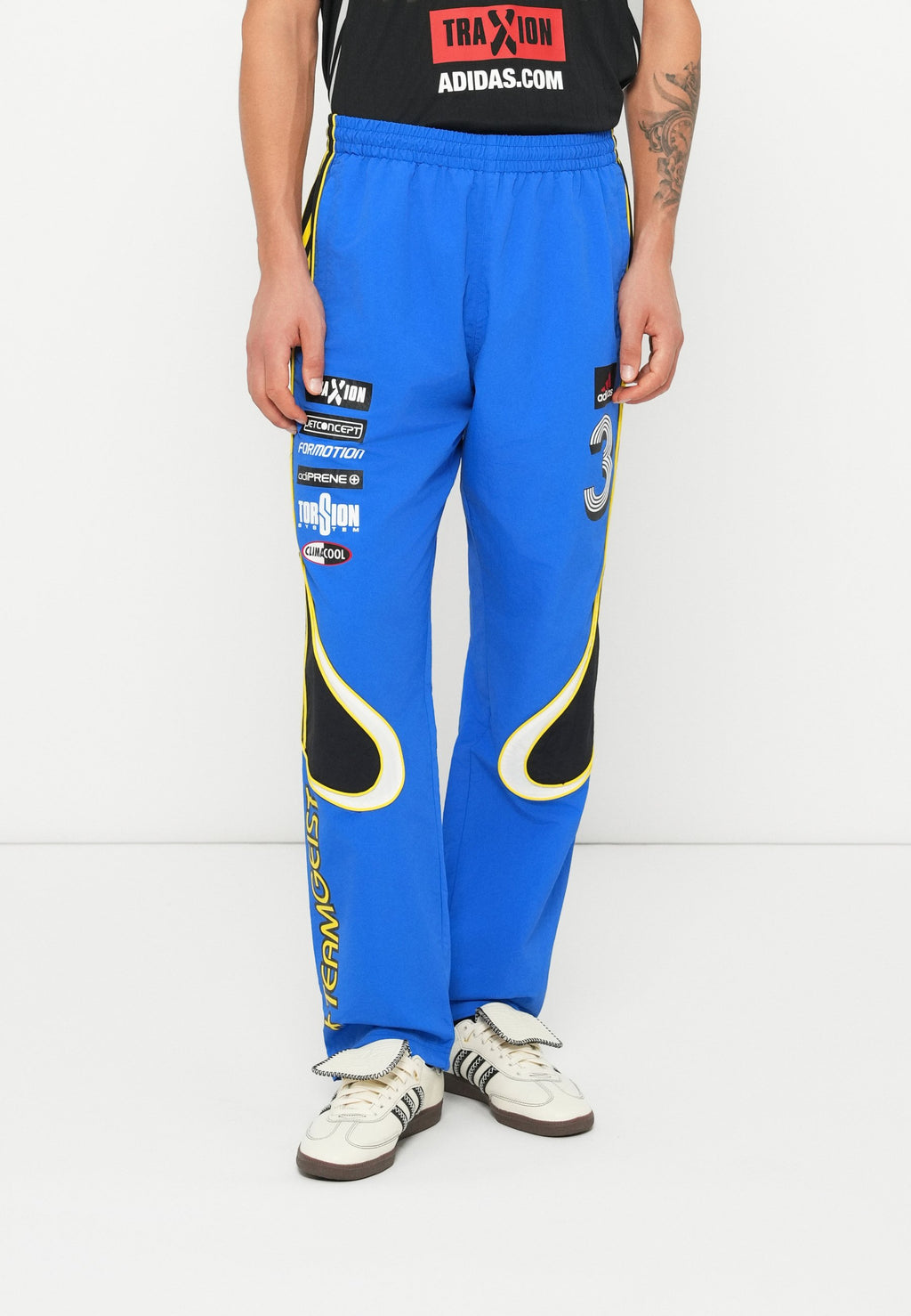 GFX TRACK PANT UNISEX - Tracksuit bottoms - blue/black/white