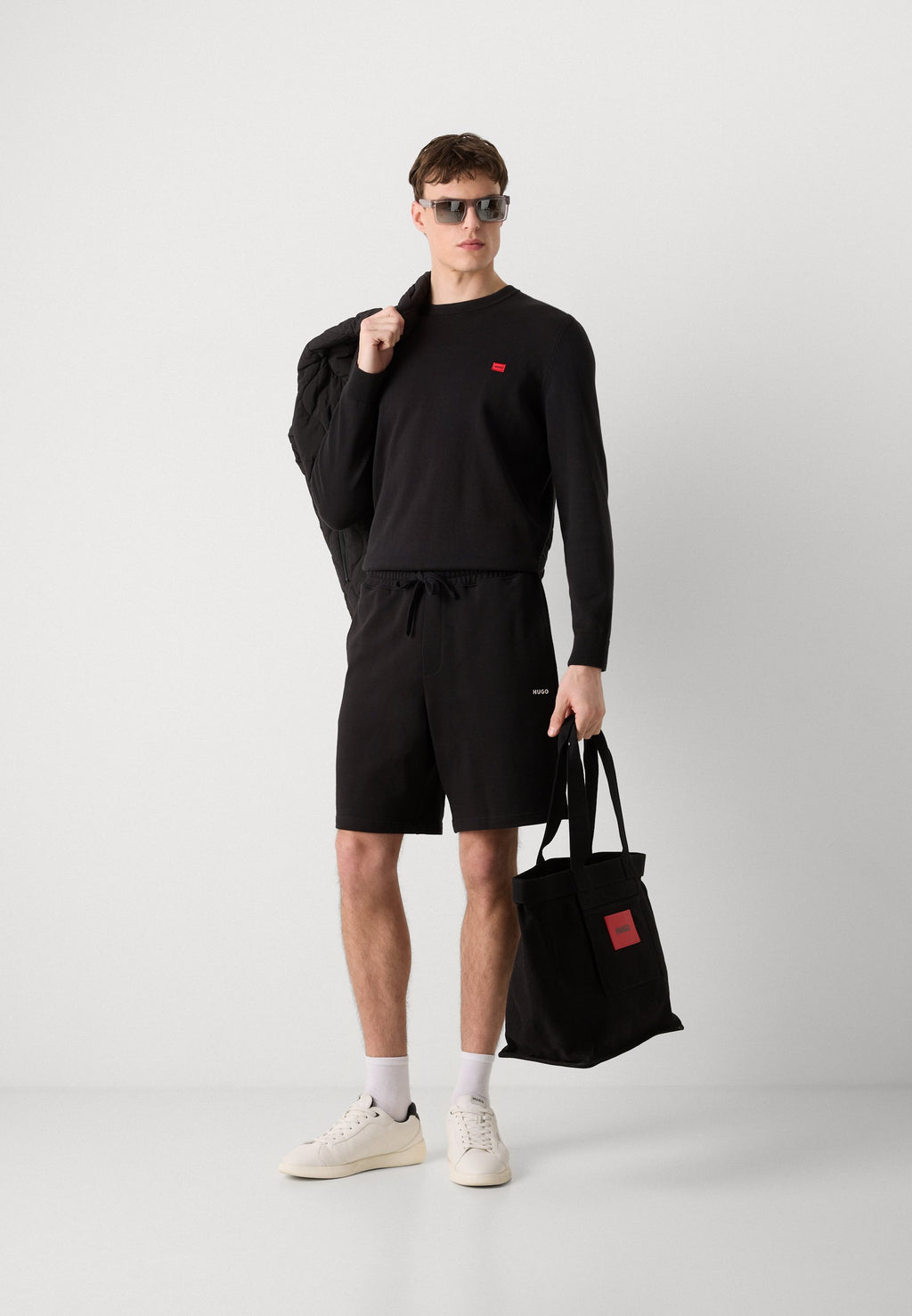 DAYONO - Tracksuit bottoms - black