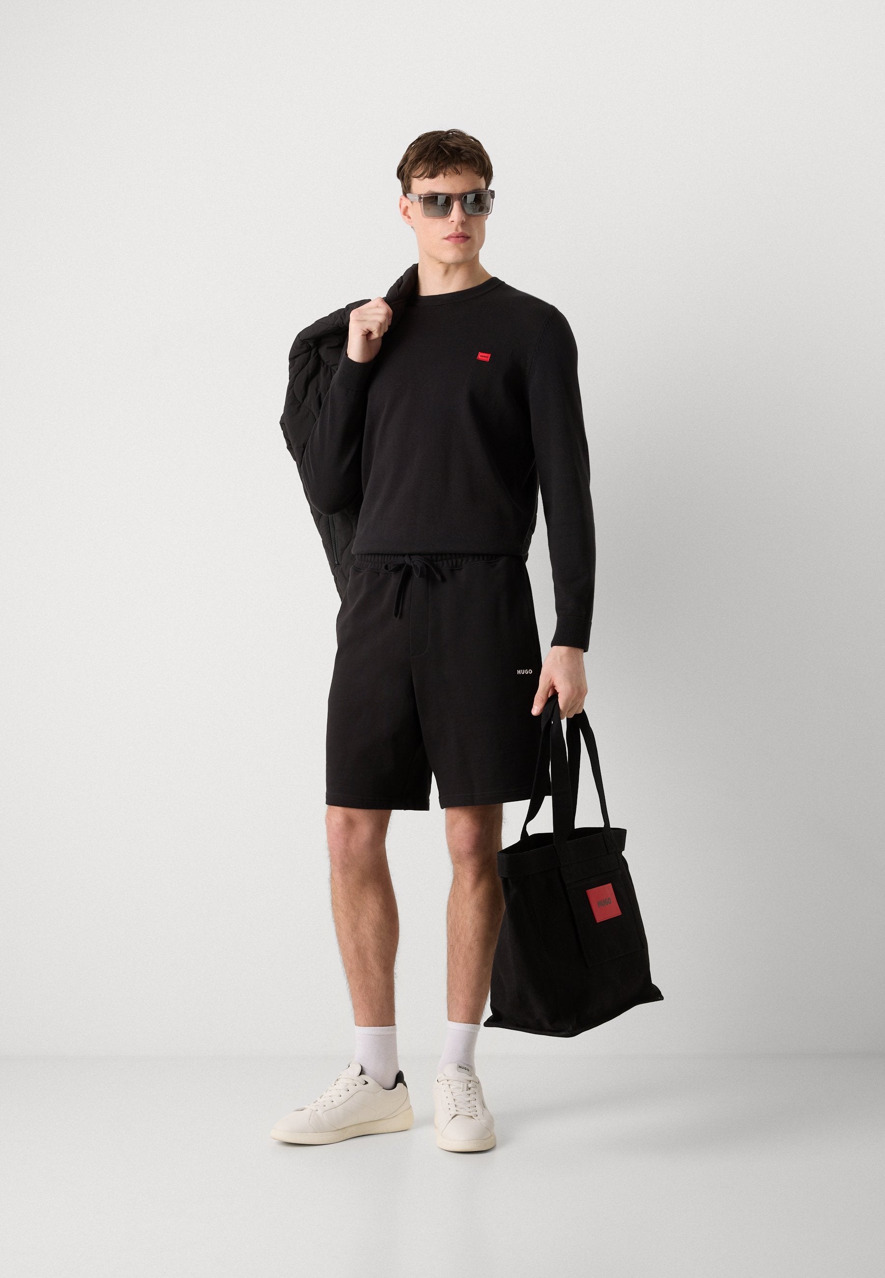 DAYONO - Tracksuit bottoms - black