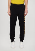 TRAIN LOGO SERIES PANTS  - Tracksuit bottoms - black/gold