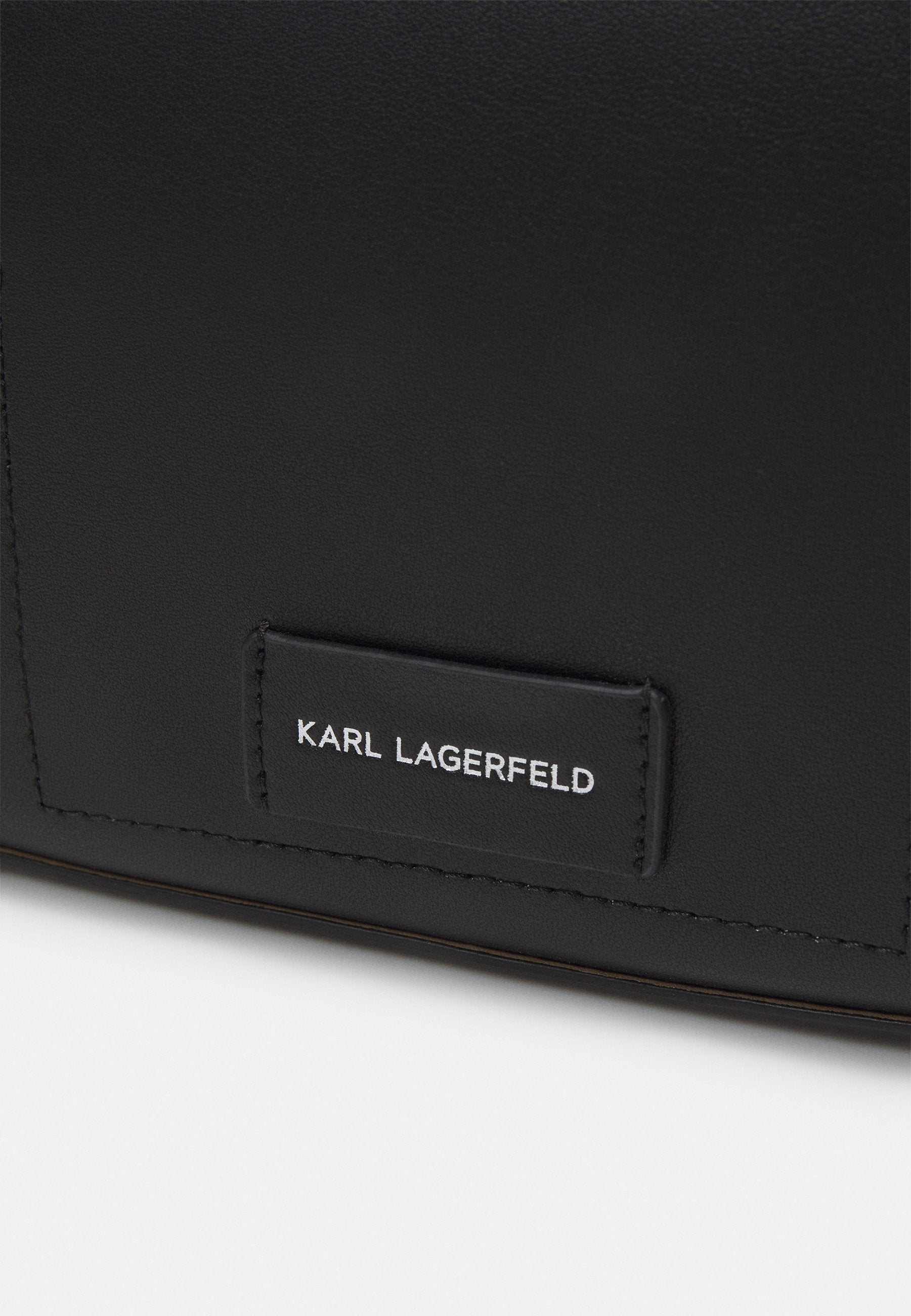 CIRCLE CAMERABAG PERFORATED - Cross body bag - black