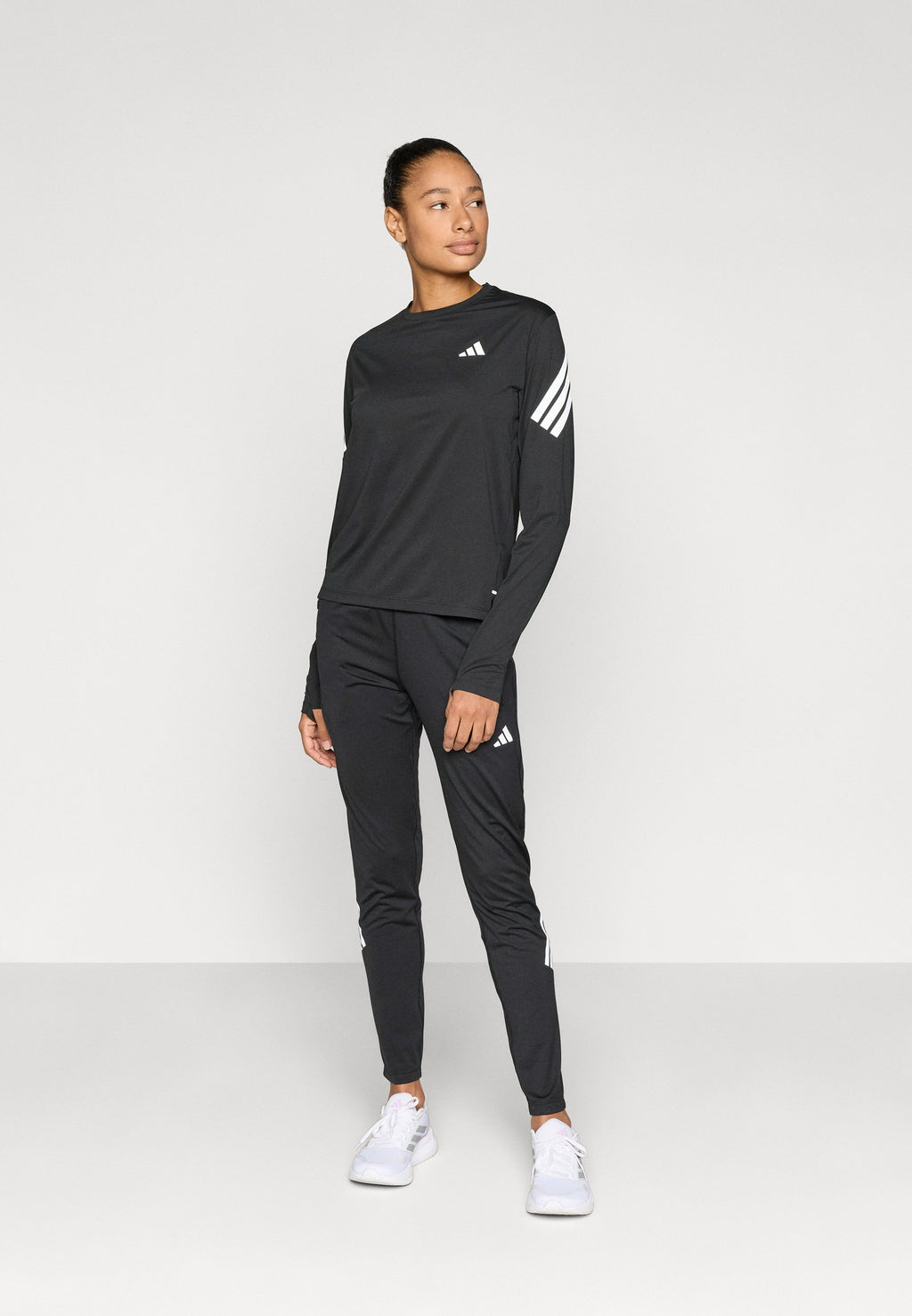 ADI365 - Tracksuit bottoms - black