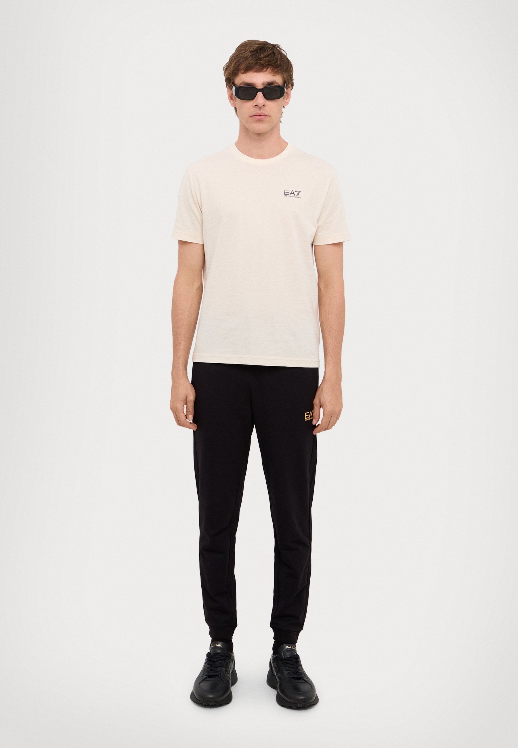 TRAIN CORE PANTS - Tracksuit bottoms - black