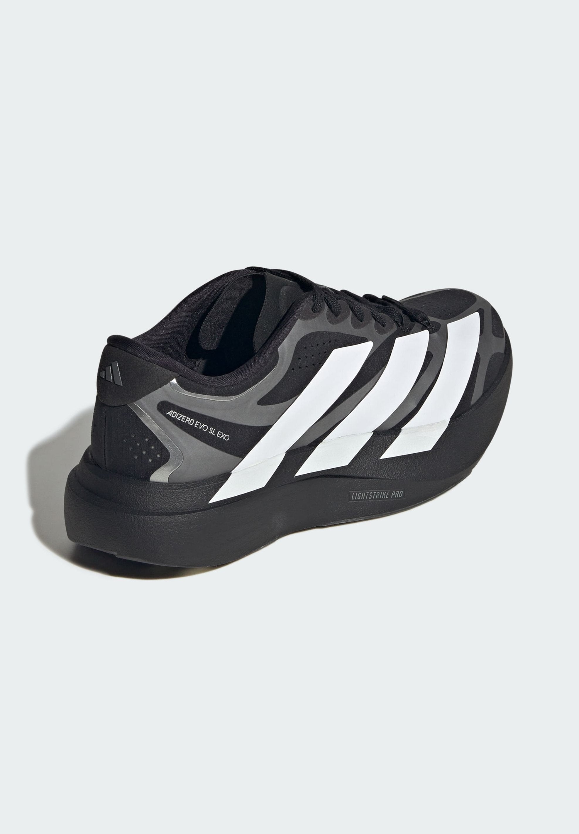 ADIZERO EVO SL EXO W - Road running shoes - core black/ftwr white/iron met.