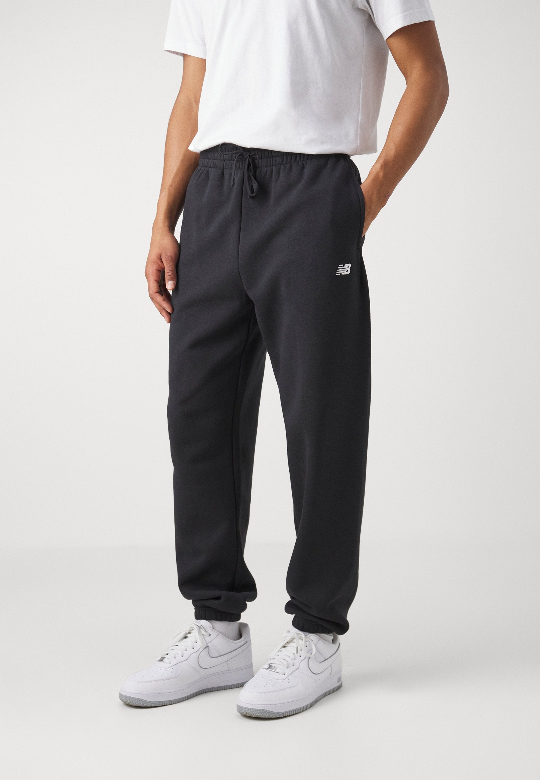 SPORT ESSENTIALS  - Tracksuit bottoms - black