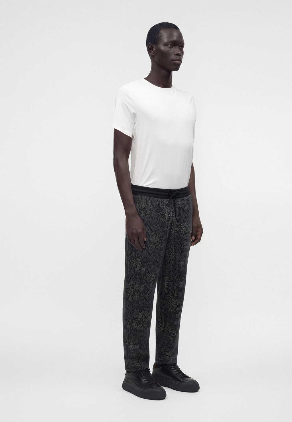 TRAIN LOGO SERIES MONOGRAM - Tracksuit bottoms - black