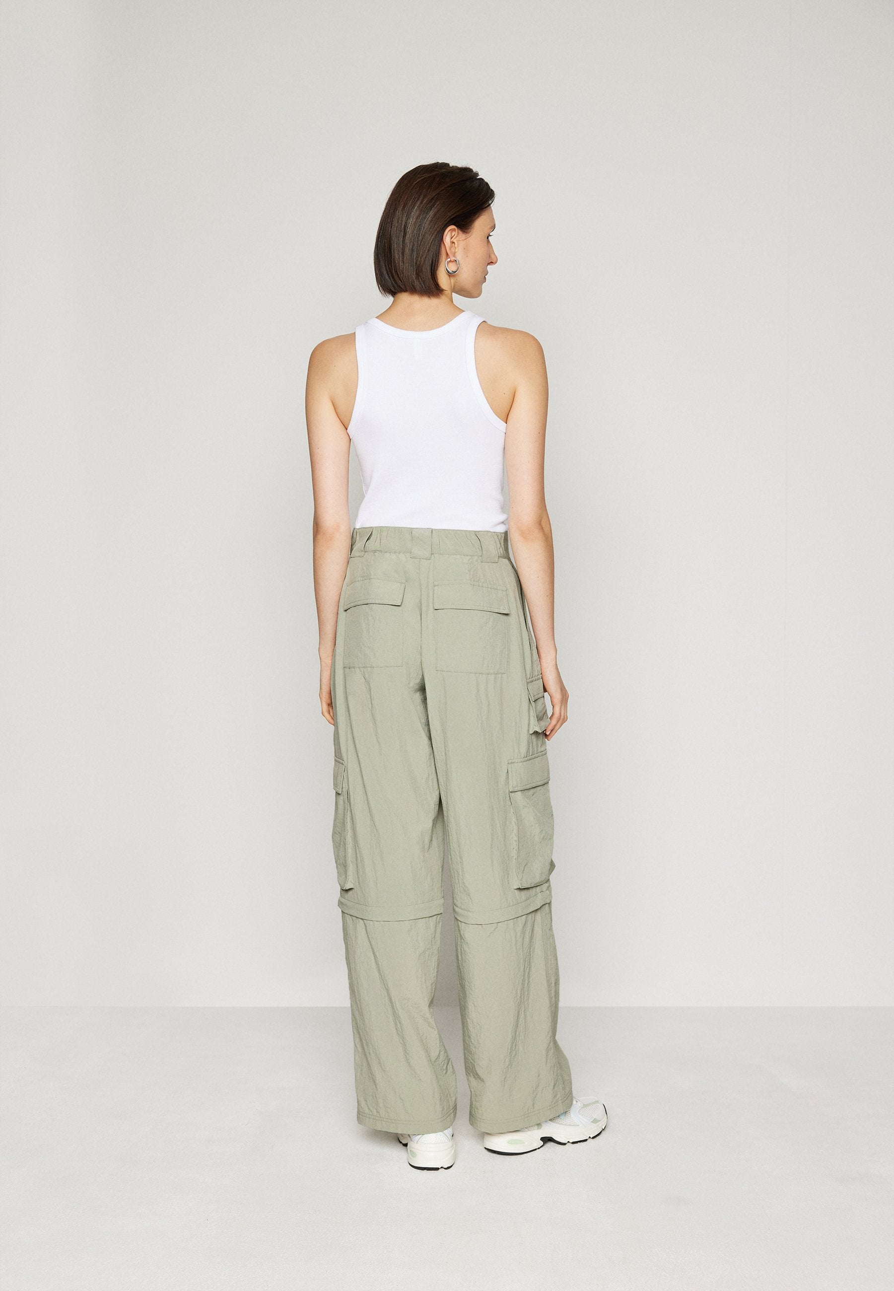 CLAIRE ZIP-OFF - Cargo trousers - faded willow