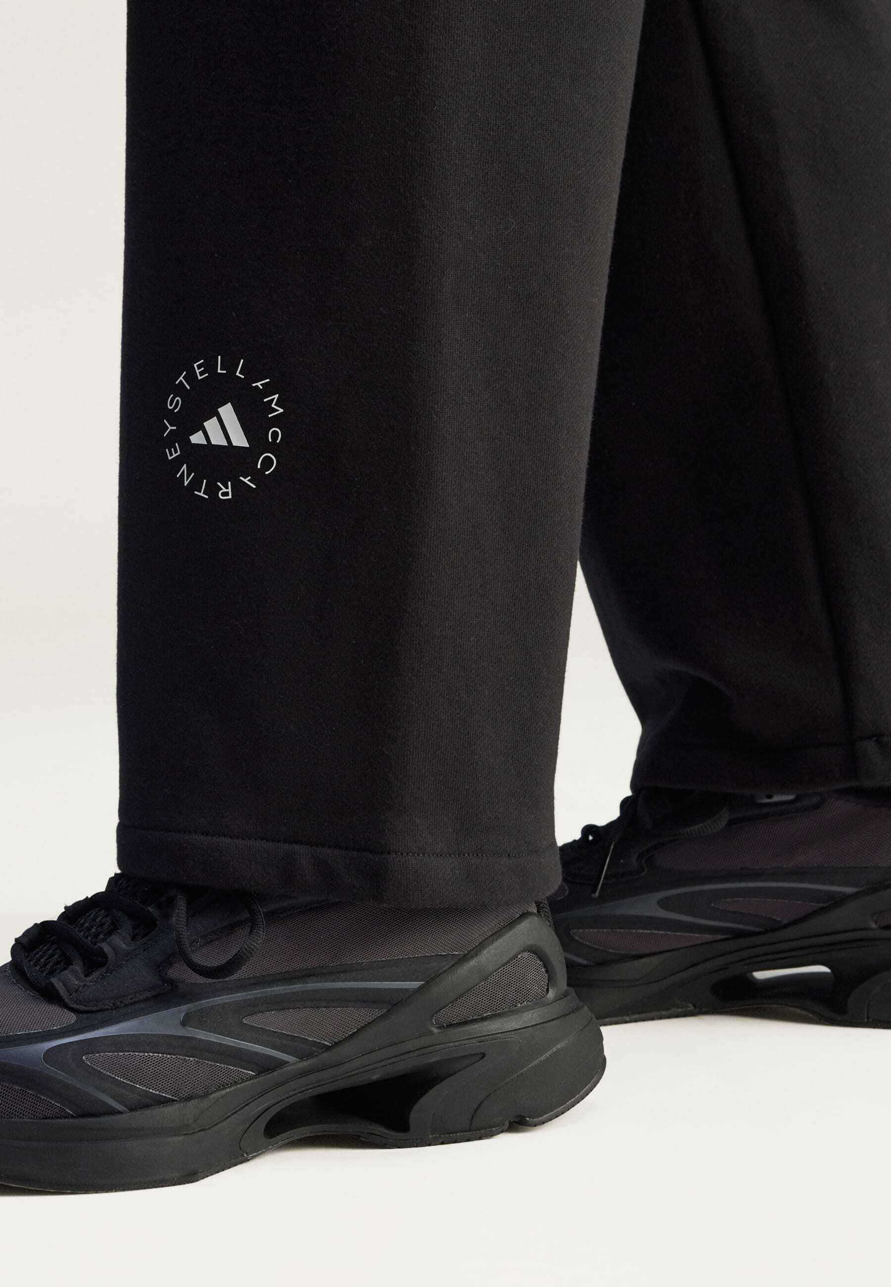 STRAIGHT - Tracksuit bottoms - black