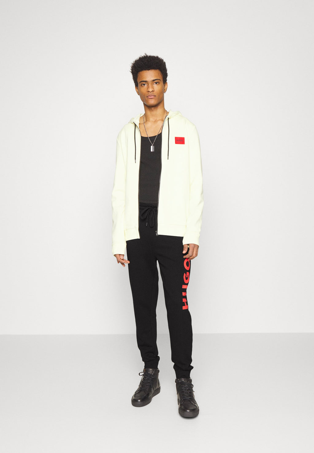 DUTSCHI - Tracksuit bottoms - black