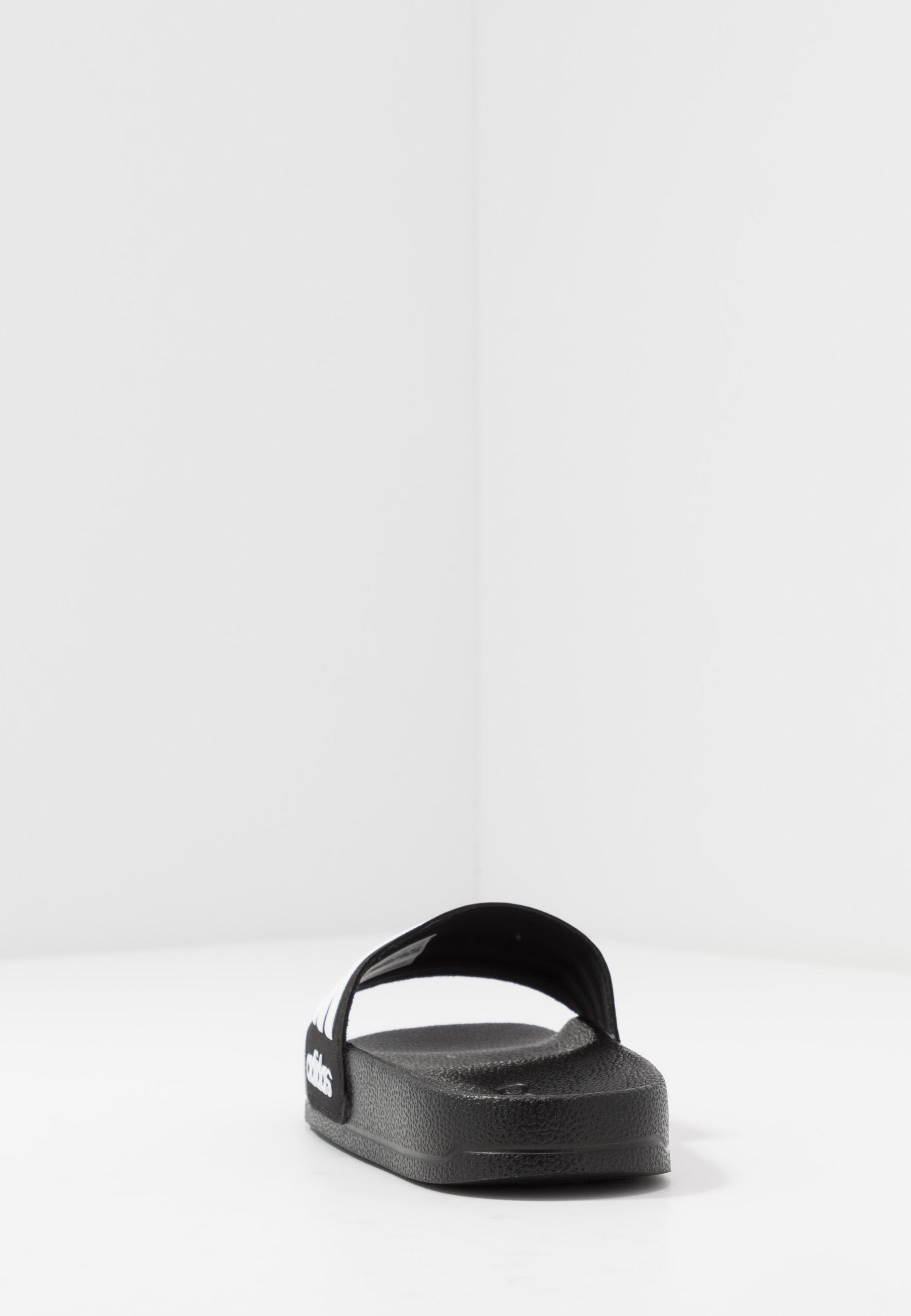 ADILETTE SHOWER UNISEX - Pool slides - core black/footwear white