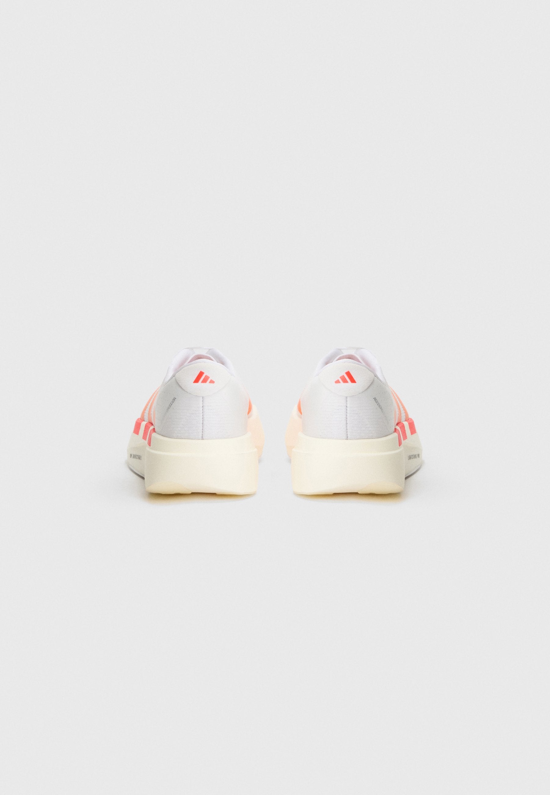 ADIZERO EVO SL J UNISEX - Road running shoes - white/pure orange/lucid red