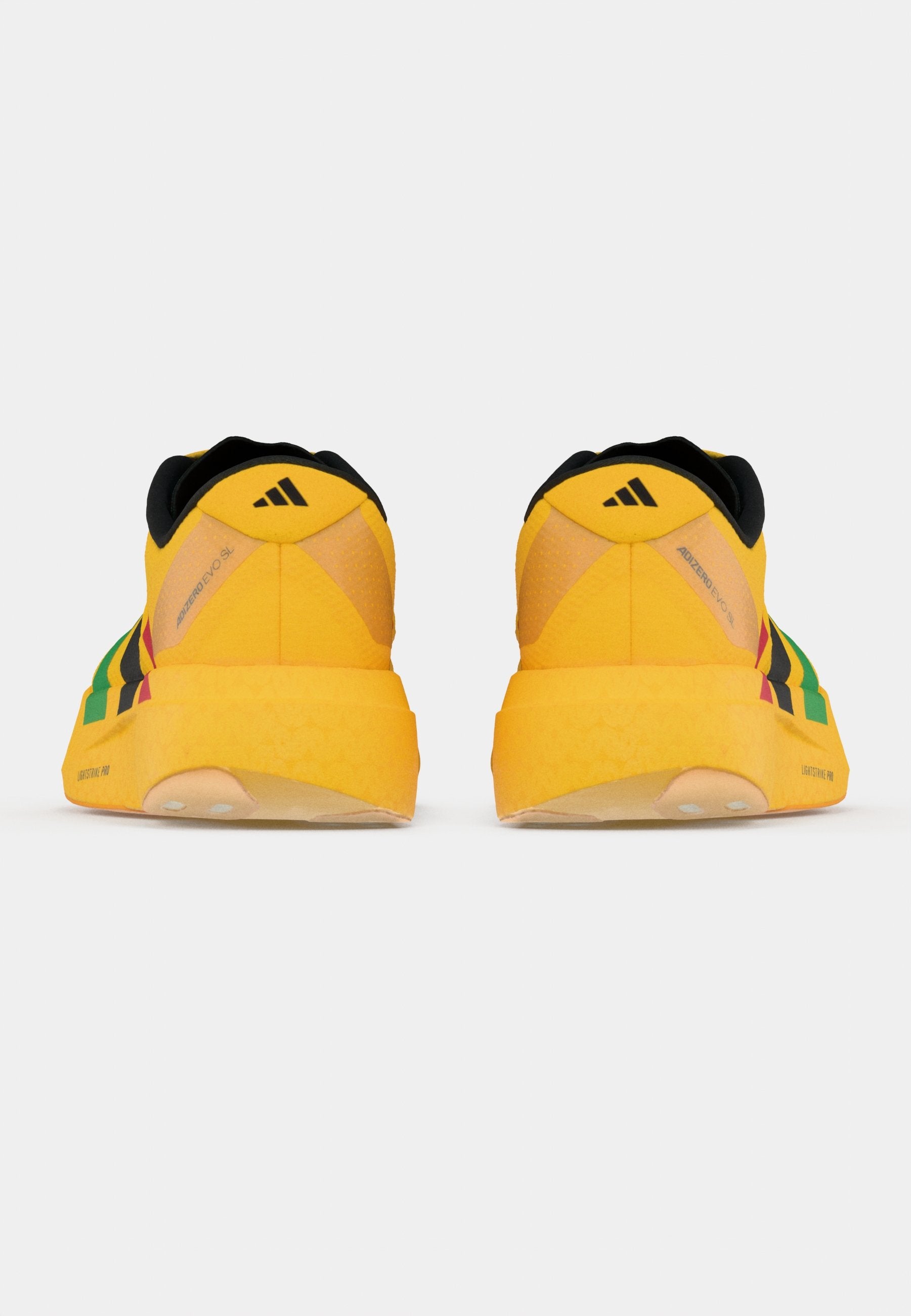 ADIZERO EVO SL - Trainers - bold gold-coloured/vivid green/pure ruby