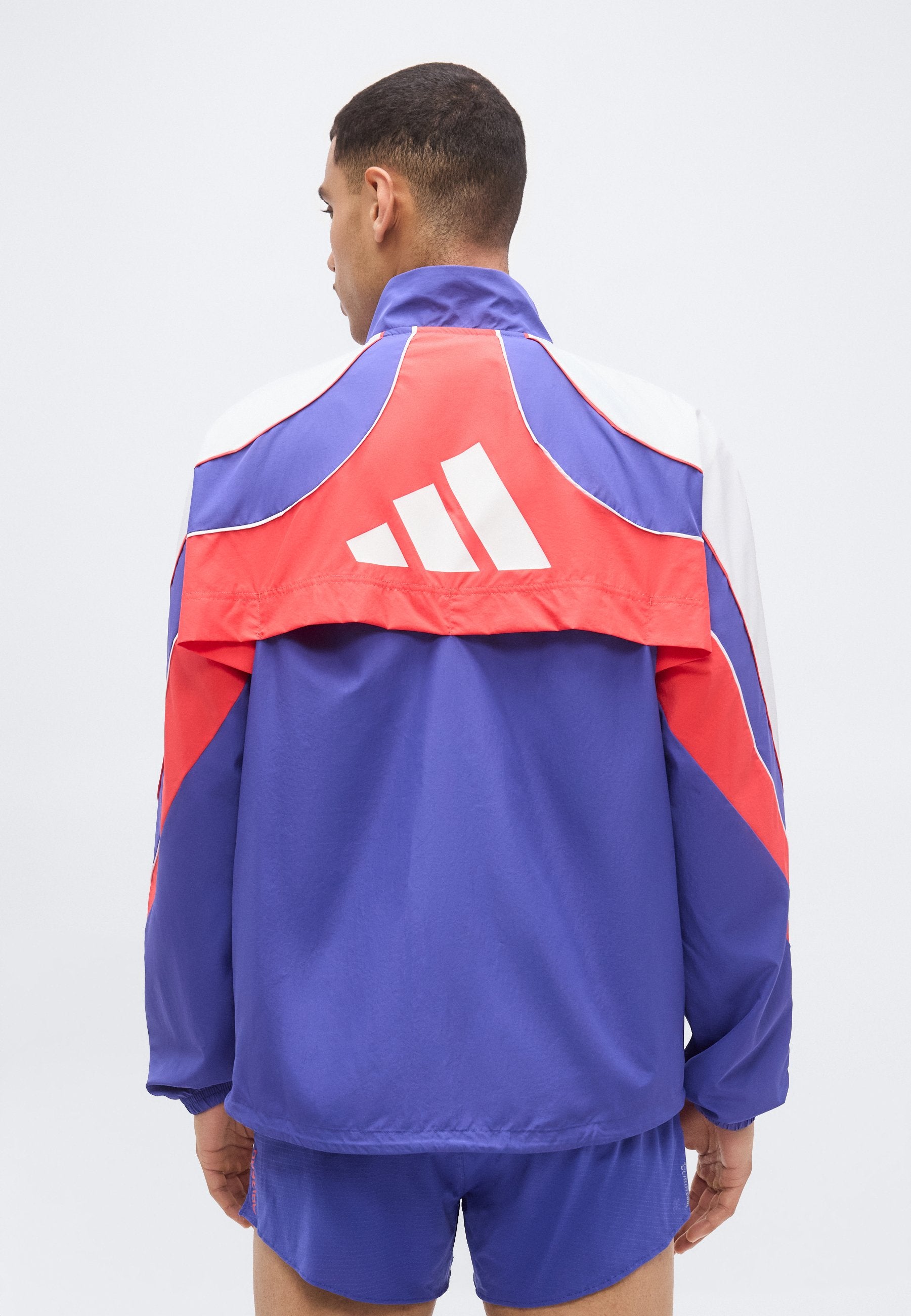 ADIZERO A JKT M - Windbreaker - dual indigo/semi lucid red/white