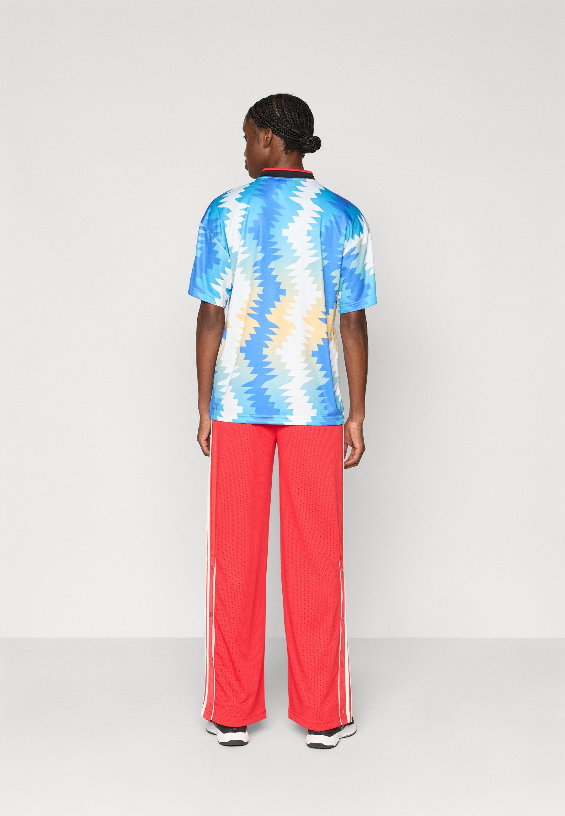STADIUM MESH - Tracksuit bottoms - pure ruby/off white/crystal linen