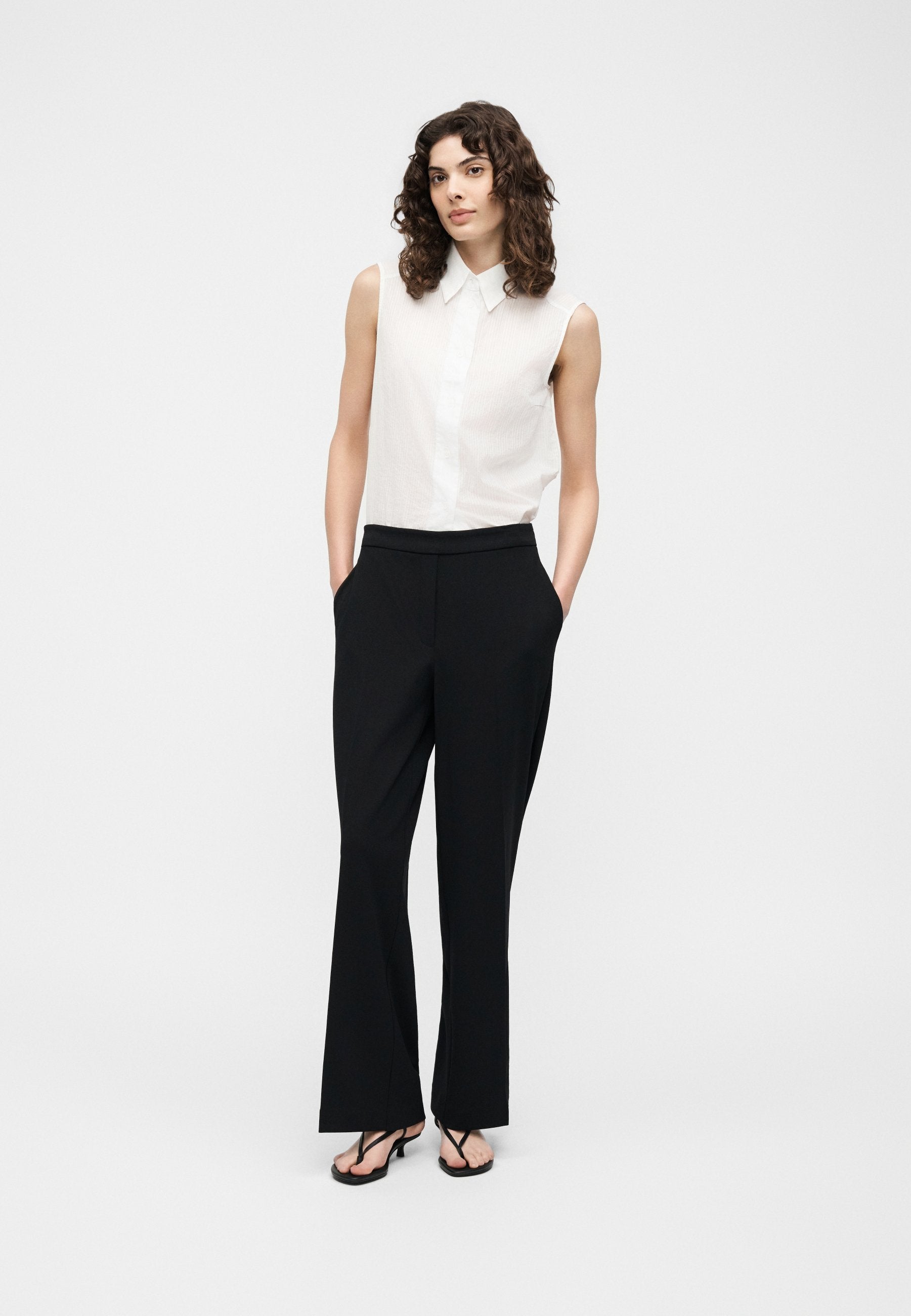 TRAVEL PANT - Trousers - black