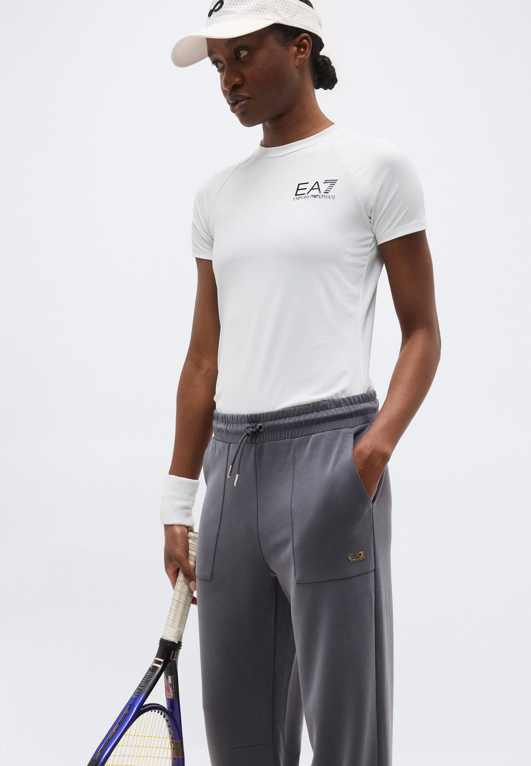 TRAIN CORE LADY RELAX - Tracksuit bottoms - gray
