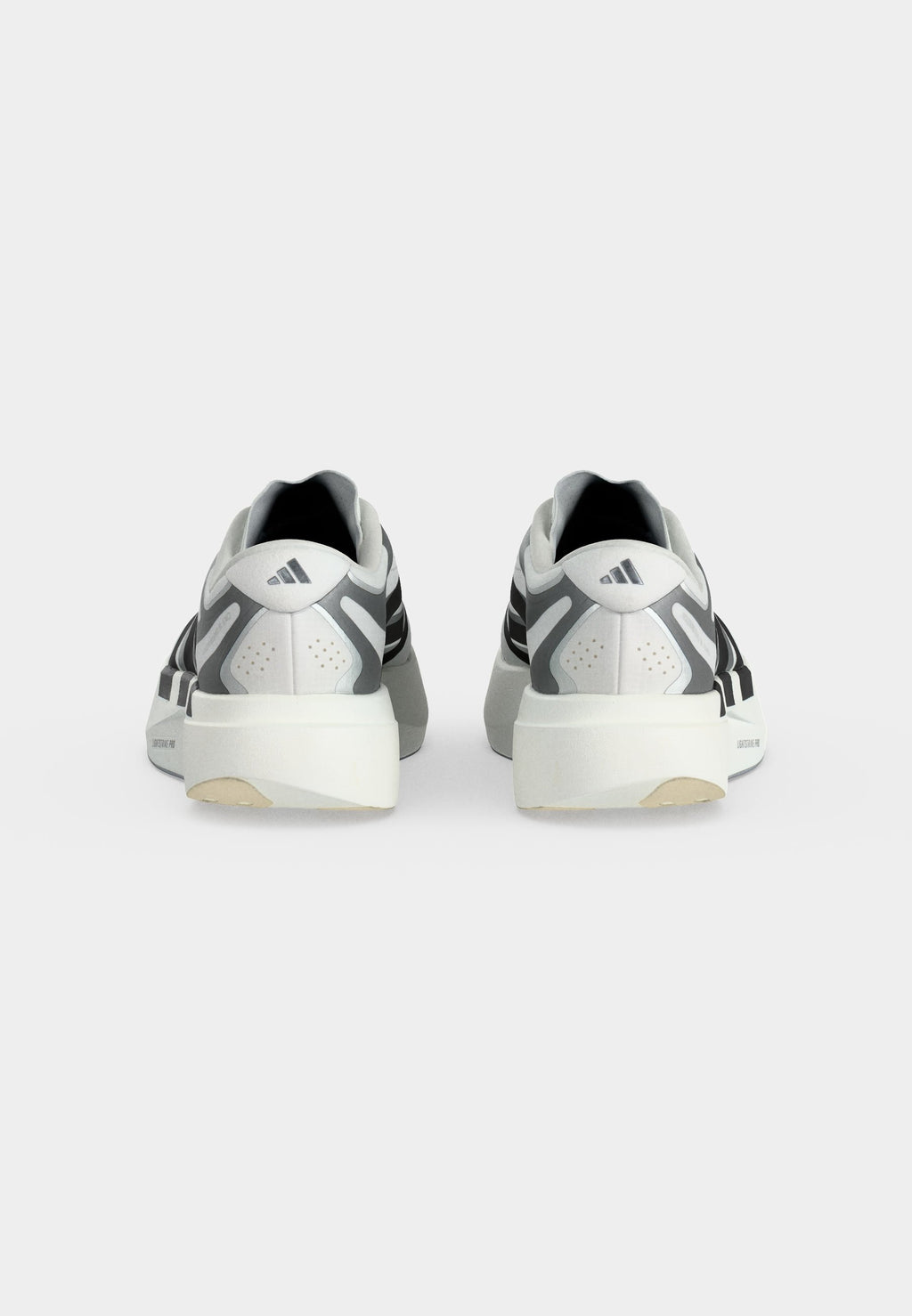 ADIZERO EVO SL EXO M - Trainers - footwear white/core black/iron metallic