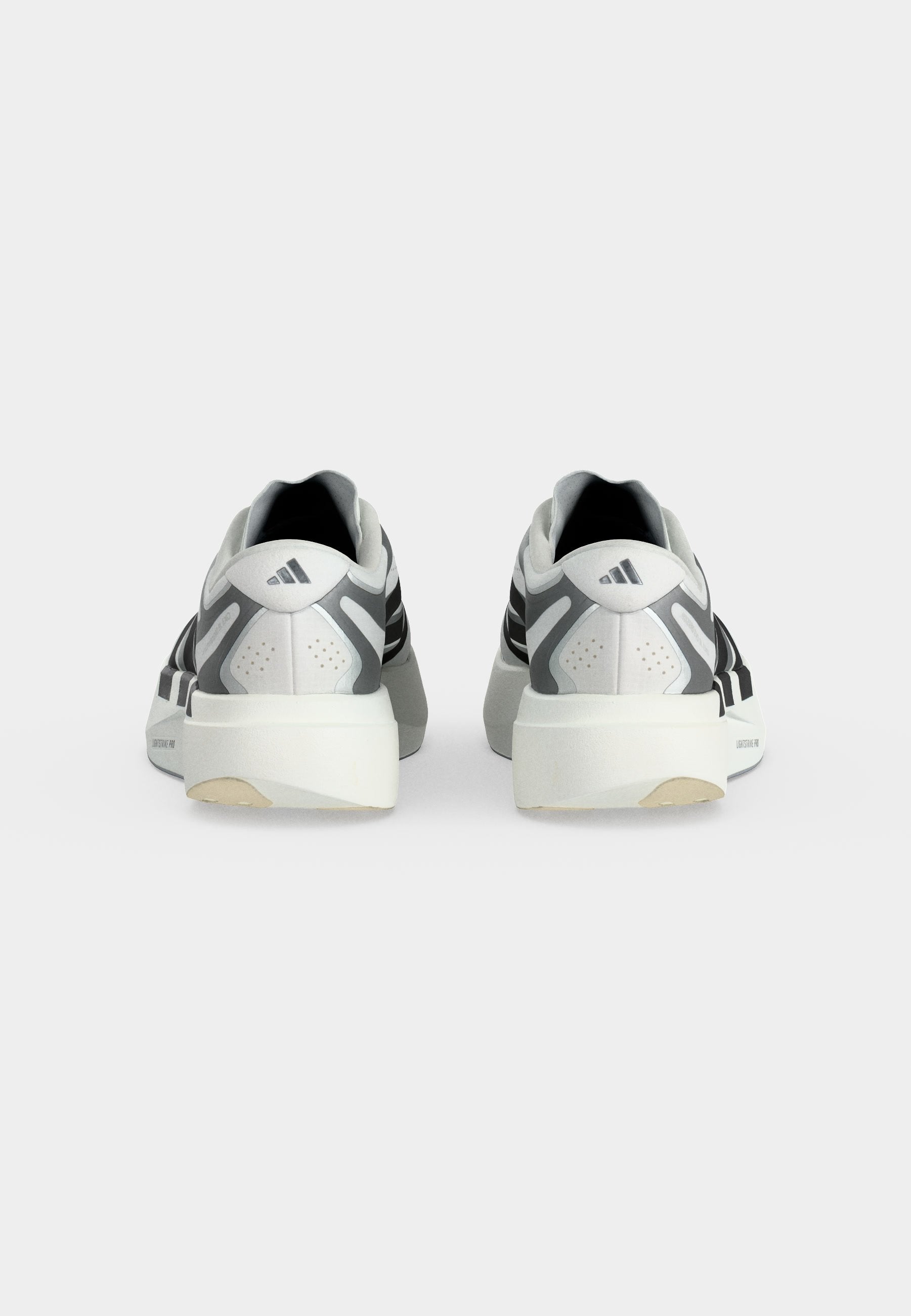 ADIZERO EVO SL EXO M - Trainers - footwear white/core black/iron metallic