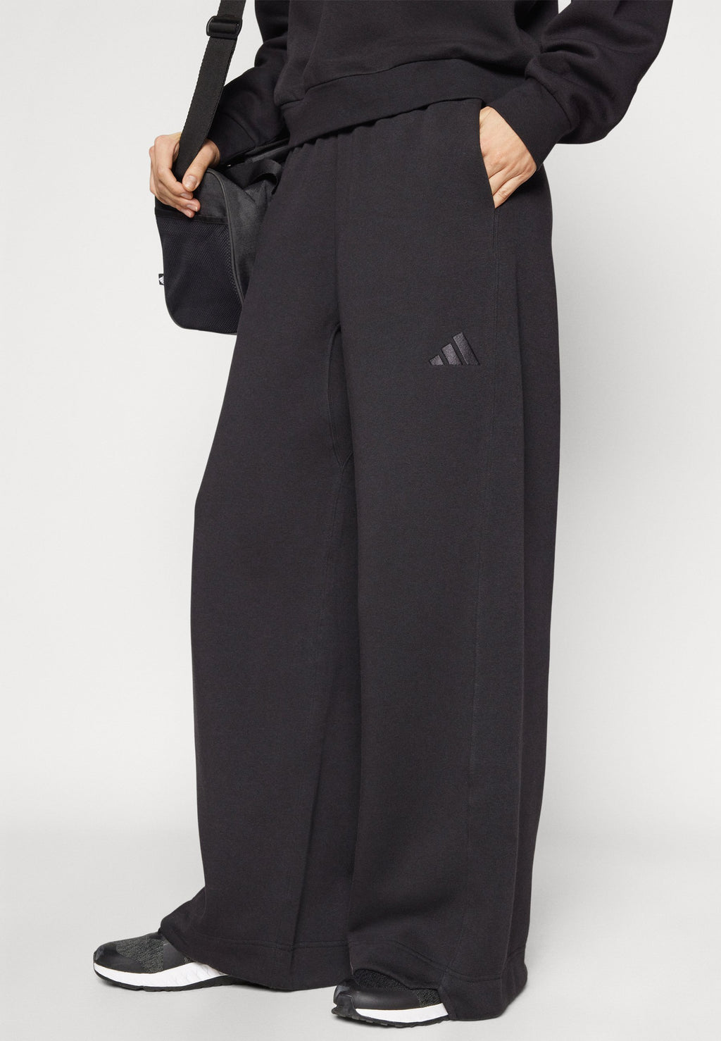 ALL SZN FLEECE LOOSE WIDE LEG - Tracksuit bottoms - black