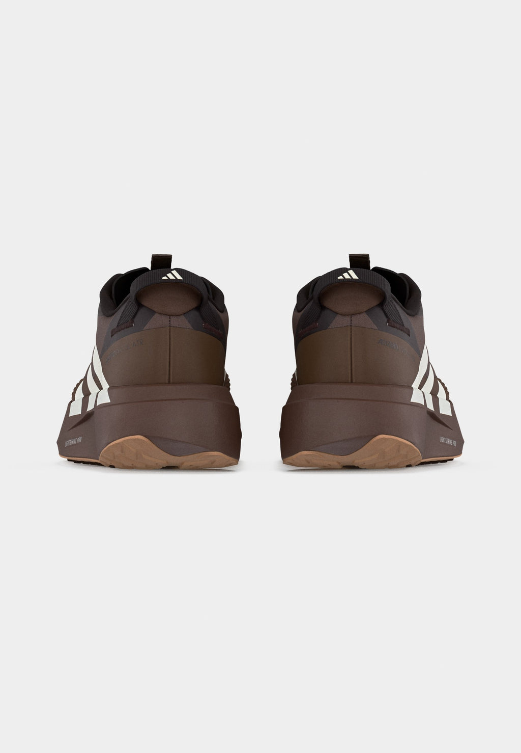 ADIZERO EVO SL ATR M - Trainers - earth strata/off white/warm sandstone