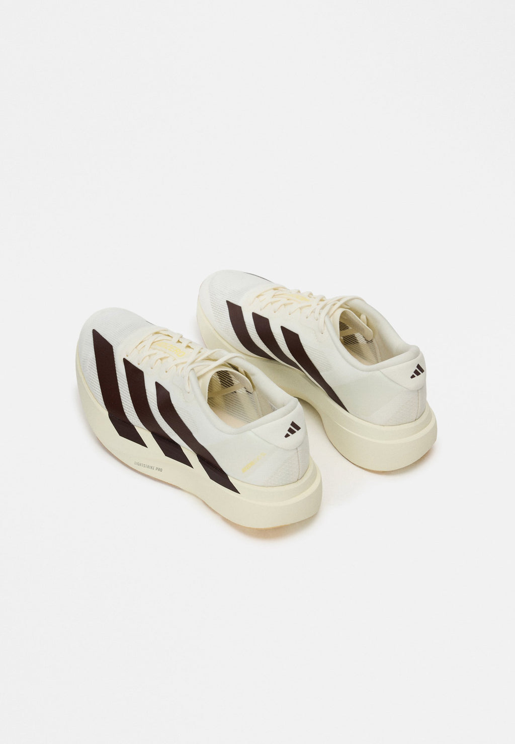 ADIZERO EVO SL M - Trainers - off white/shadow brown/almost yellow