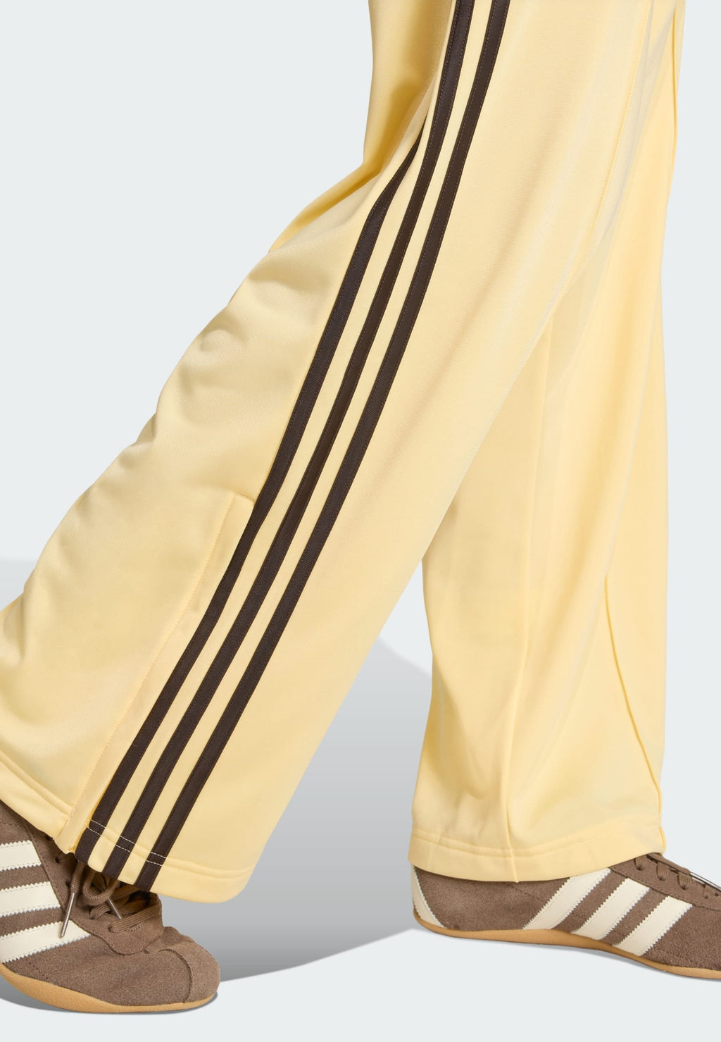 LOOSE - Tracksuit bottoms - orange tint