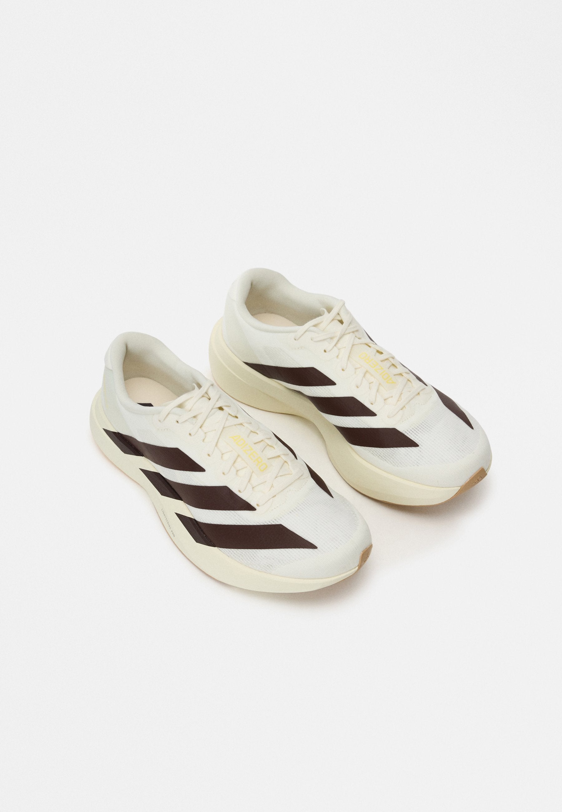 ADIZERO EVO SL M - Trainers - off white/shadow brown/almost yellow