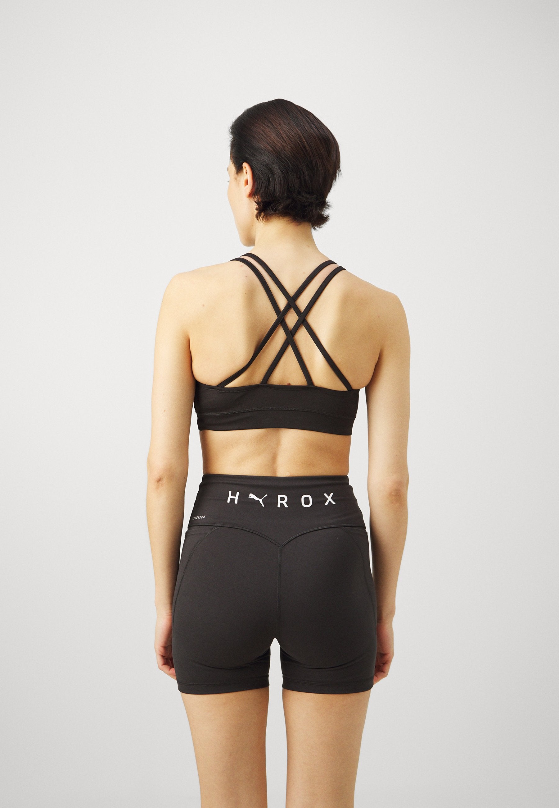PUMA X HYROX MOVE STRAPPY BRA - Medium support sports bra - black