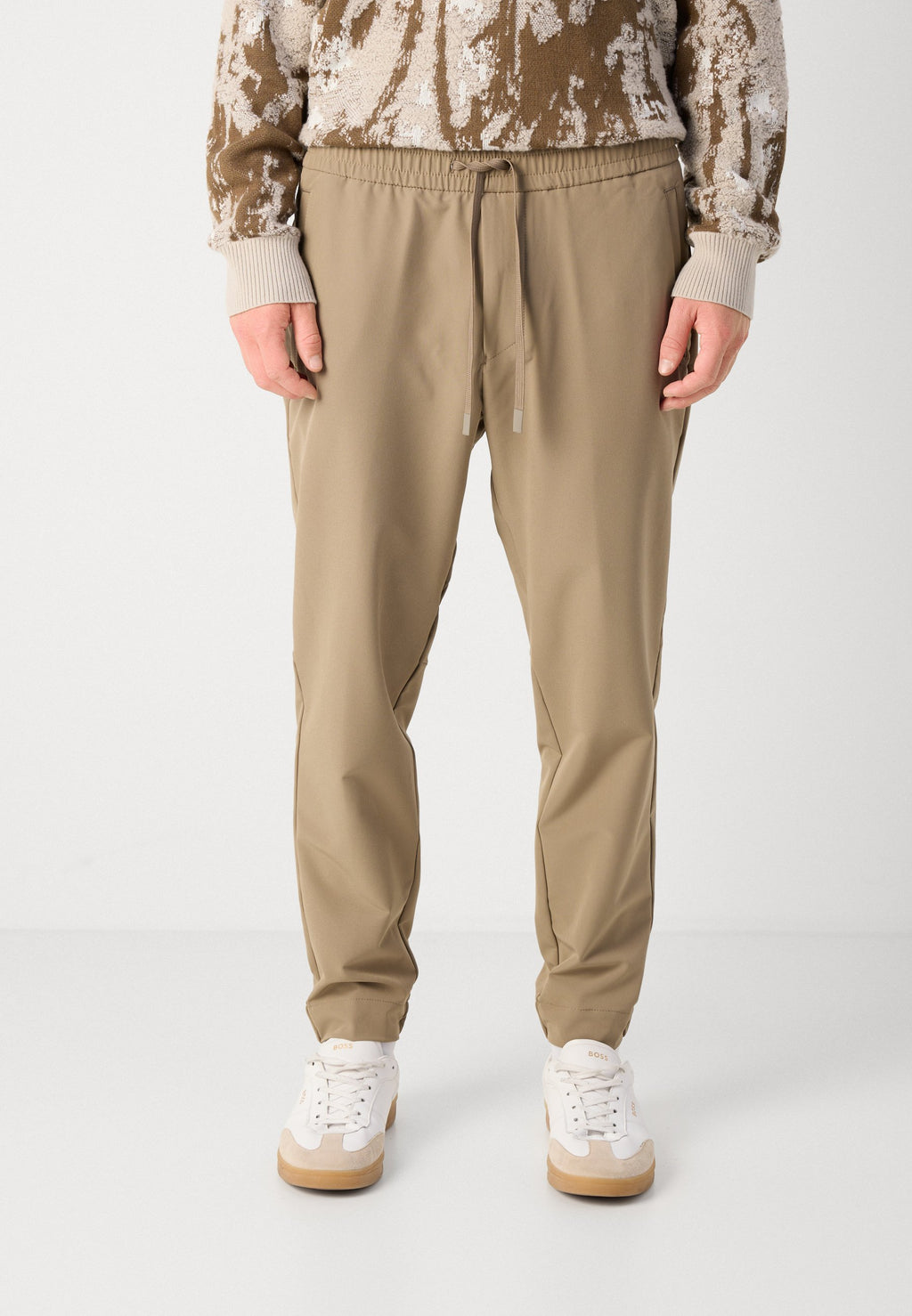 T_FLEX - Trousers - light/pastel green