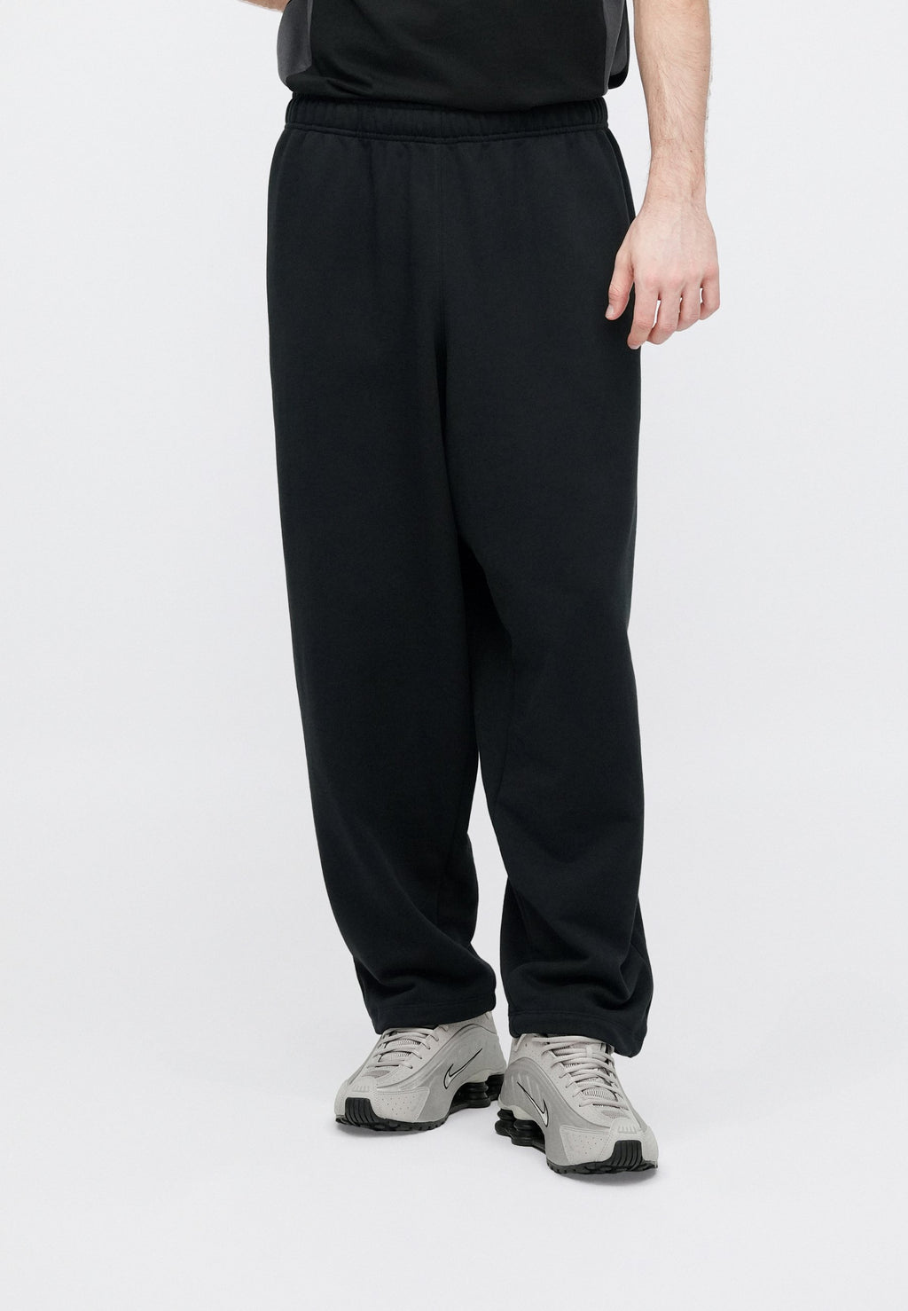 CLUB - Tracksuit bottoms - black/white