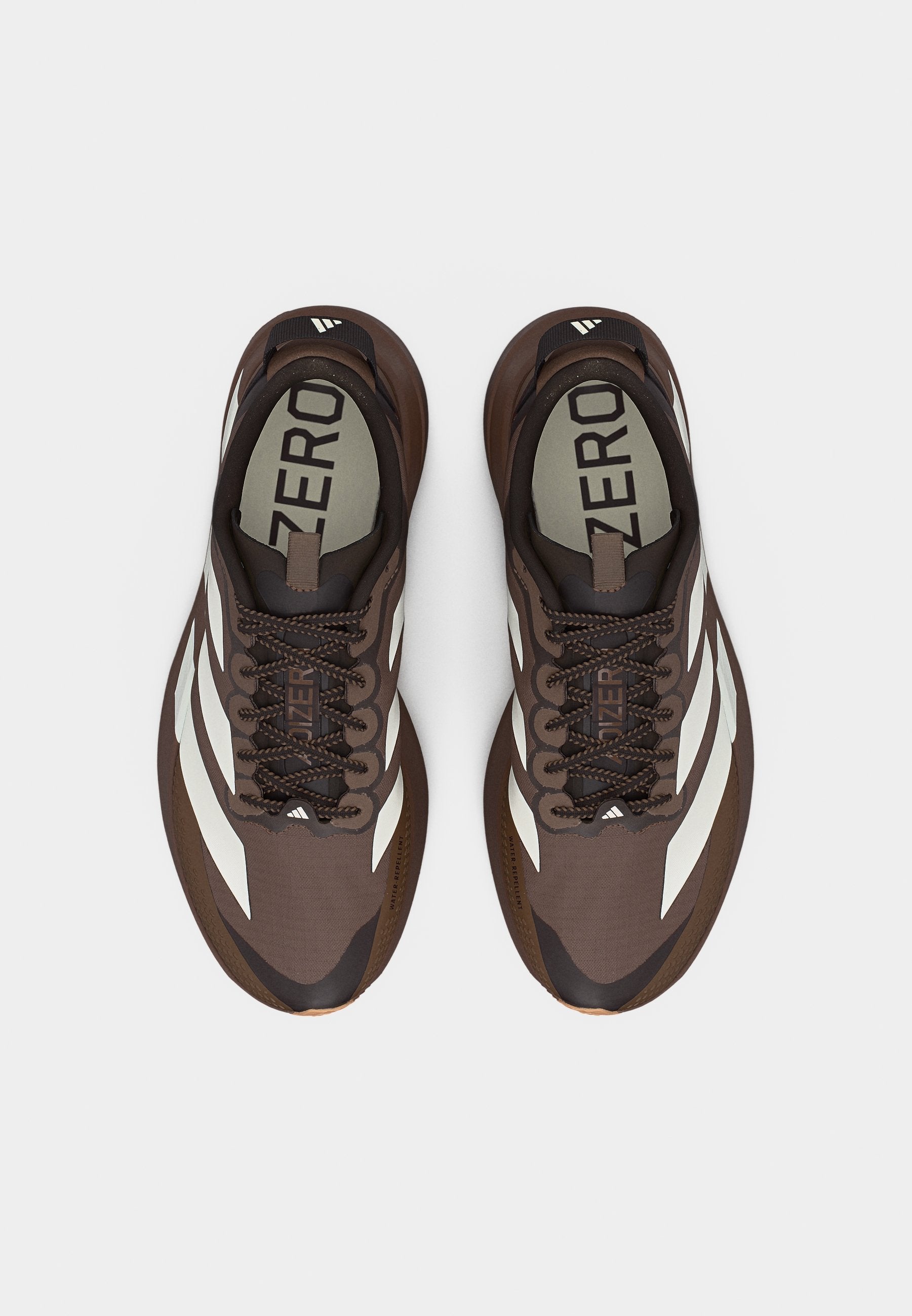 ADIZERO EVO SL ATR M - Trainers - earth strata/off white/warm sandstone