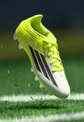 F50 CLUB MULTI - Football boots artificial grass - team solar yellow 2/core black/lucid red