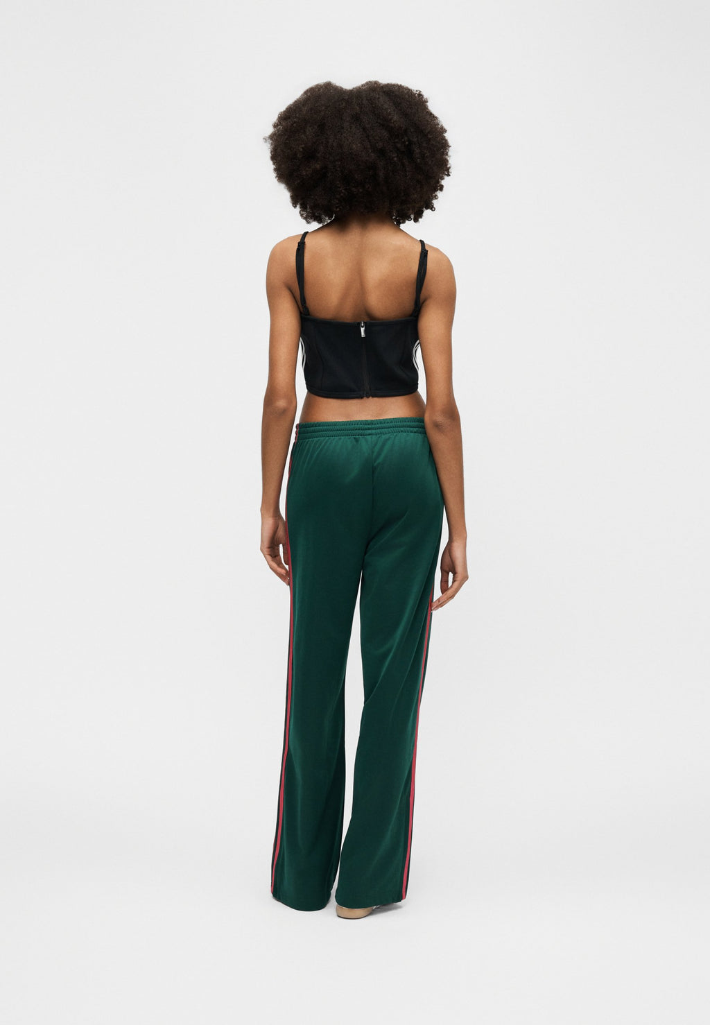 PANTALON DE SURVÊTEMENT FIREBIRD LOOSE - Bas de survêtement - vert université/magenta vif