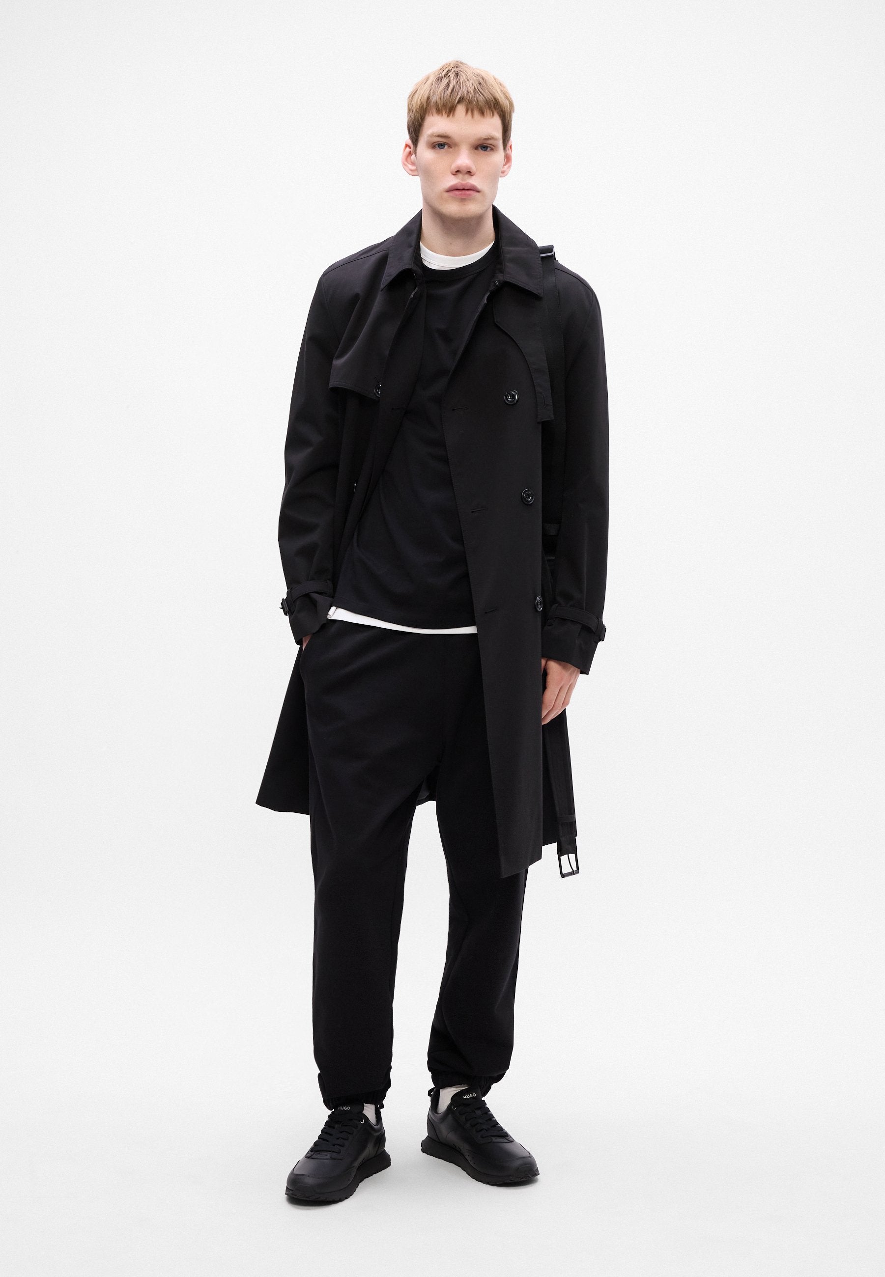 NYROTRO - Tracksuit bottoms - black