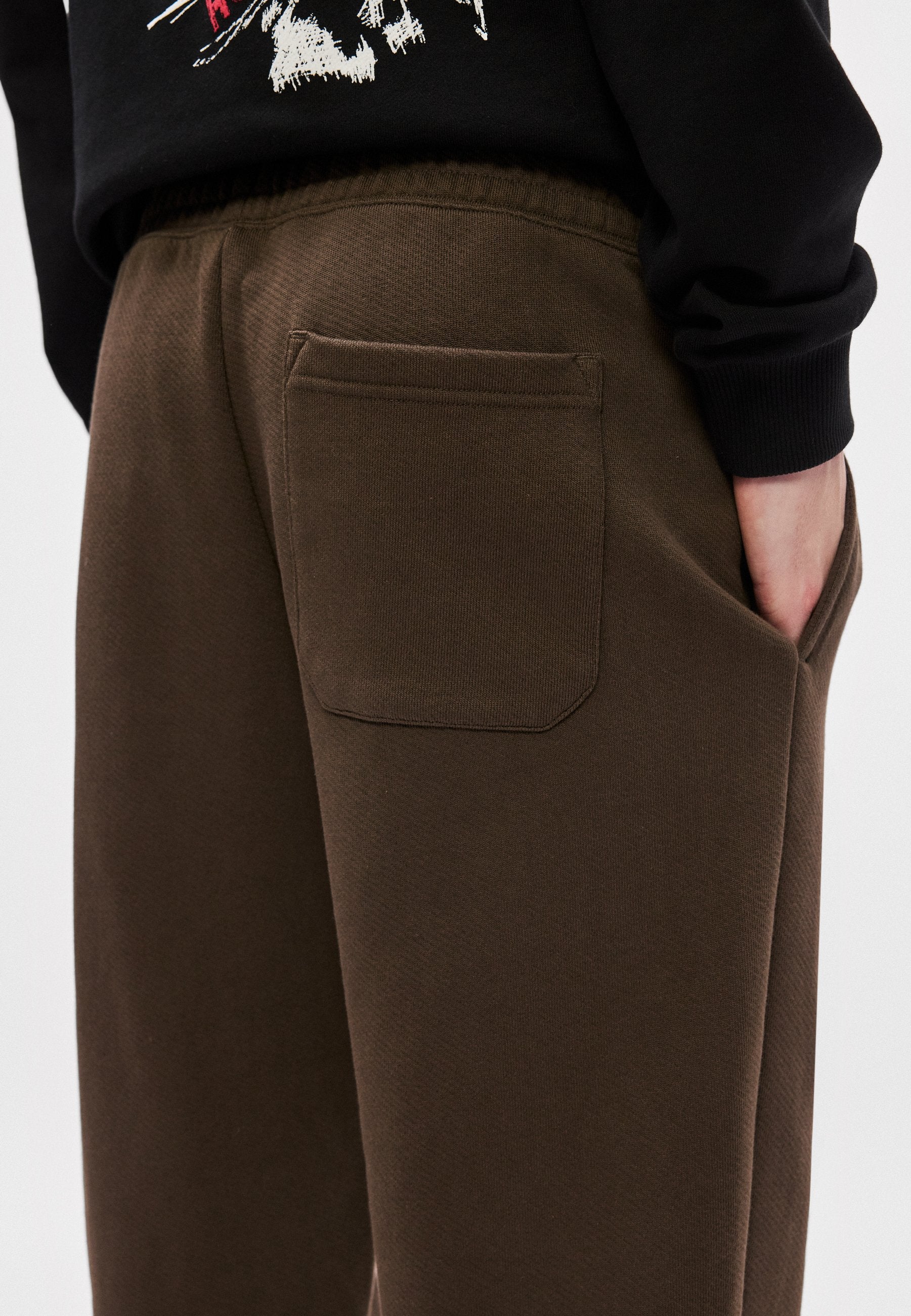 NEVEZ - Tracksuit bottoms - dark brown