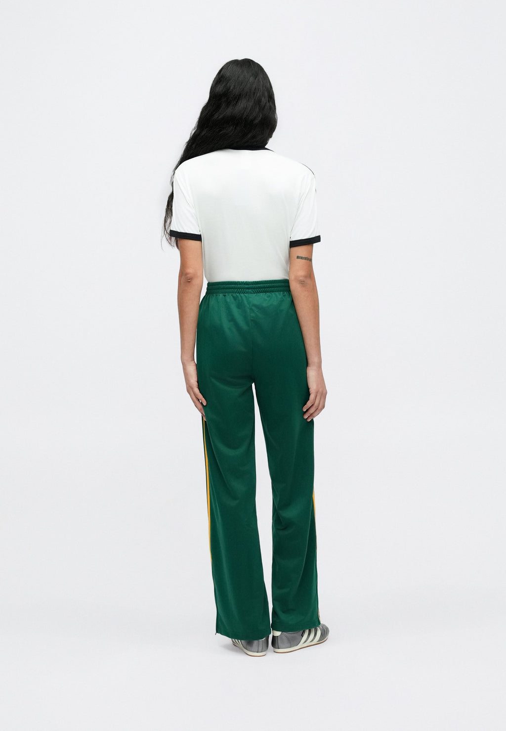 FIREBIRD LOOSE TRACKSUIT PANTS - Tracksuit bottoms - collegiate green/crew yellow