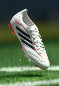COPA PURE IV CLUB - Firm-ground football boots - metallic/core black/lucid red