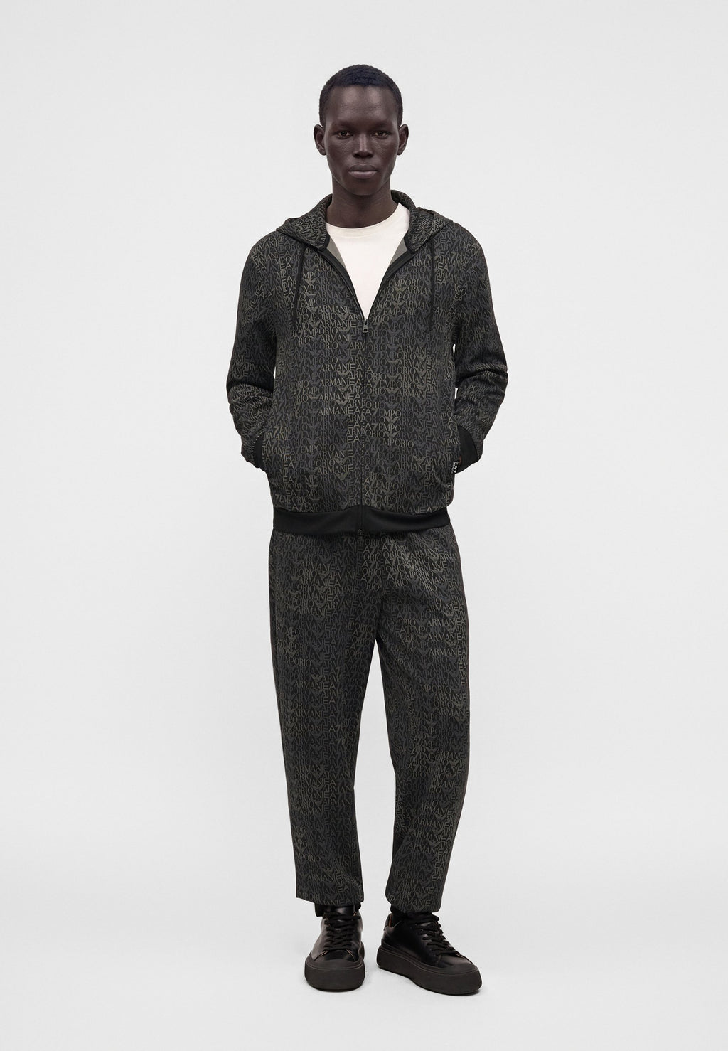 TRAIN LOGO SERIES MONOGRAM - Tracksuit bottoms - black