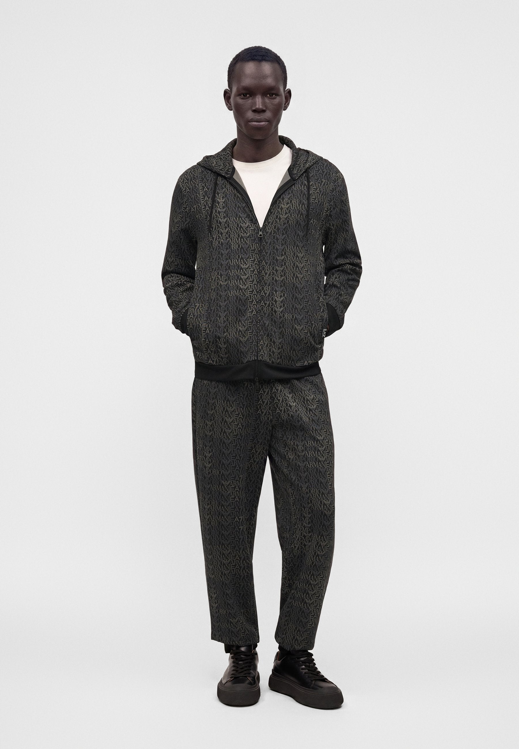 TRAIN LOGO SERIES MONOGRAM - Tracksuit bottoms - black