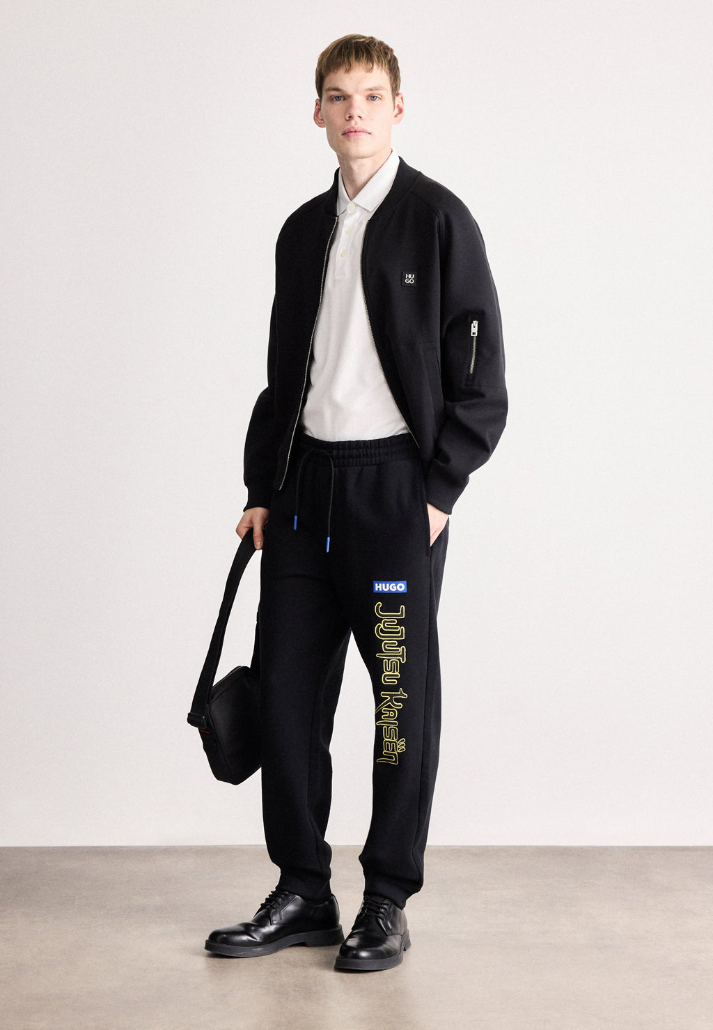 X JUJUTSU KAISEN NIMAYTRO - Tracksuit bottoms - black