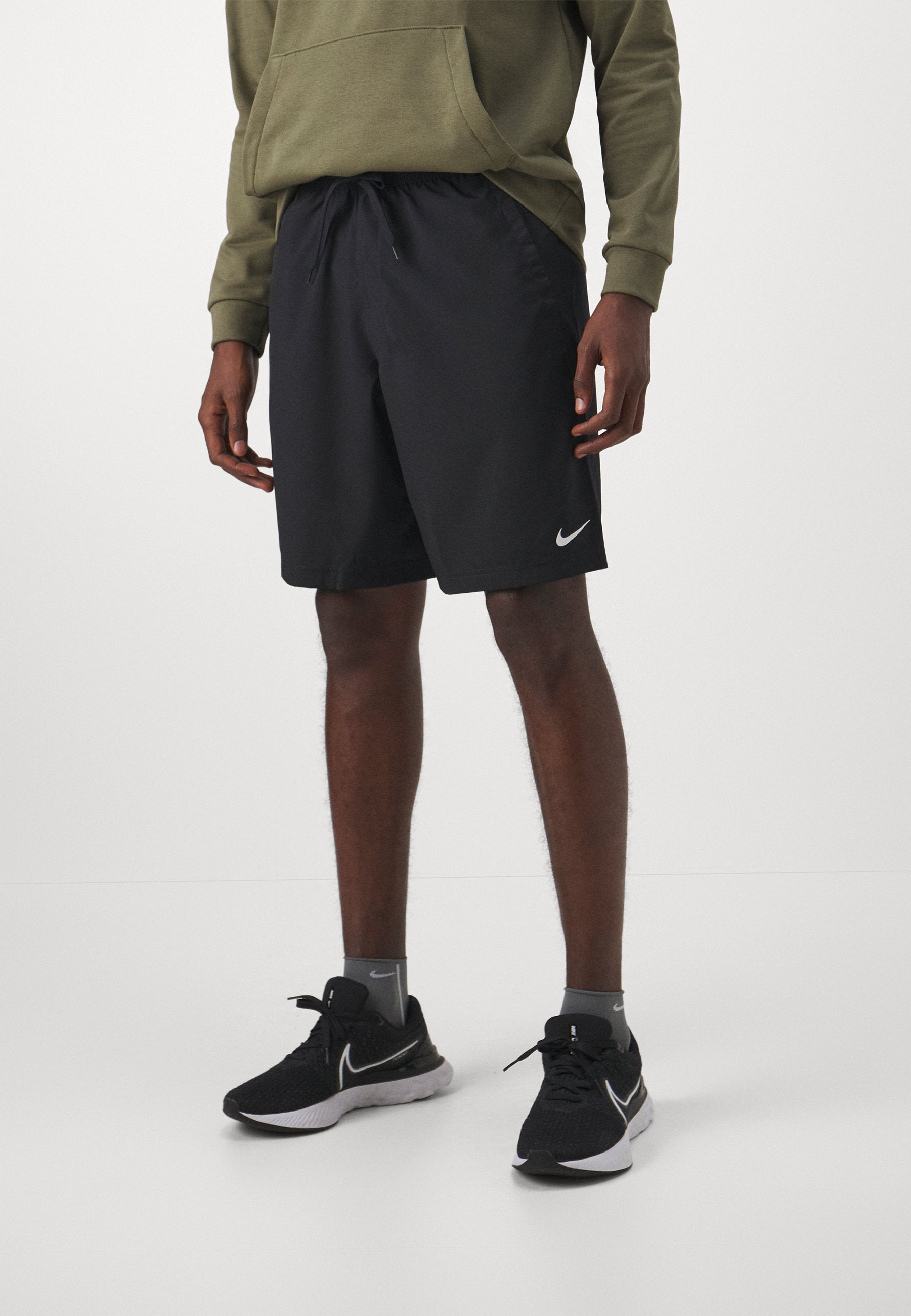 M NK DF FORM 9IN UL SHORT - Sports shorts - black/white