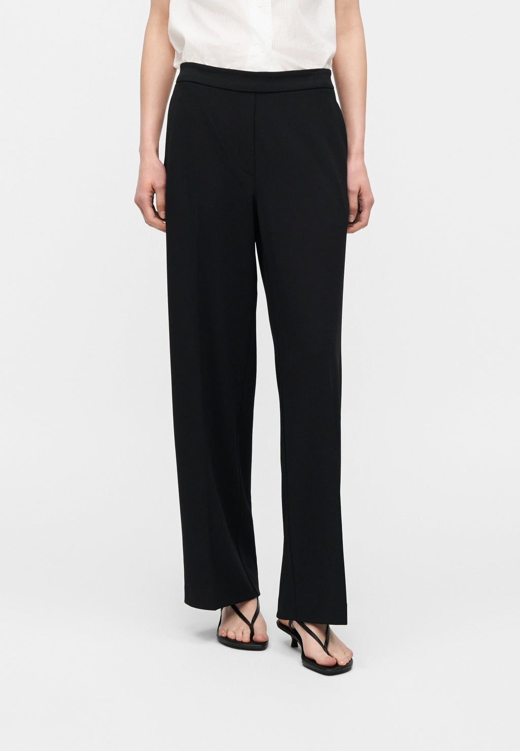 TRAVEL PANT - Trousers - black