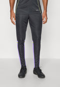 SQUADRA REGULAR FIT - Tracksuit bottoms - black/purple rush